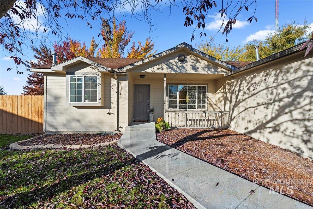 View of front of property with brick siding and Brand New Stamped concrete walkway!