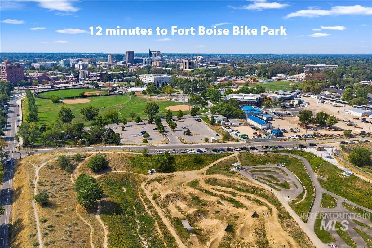 View of property location with nearby urban area