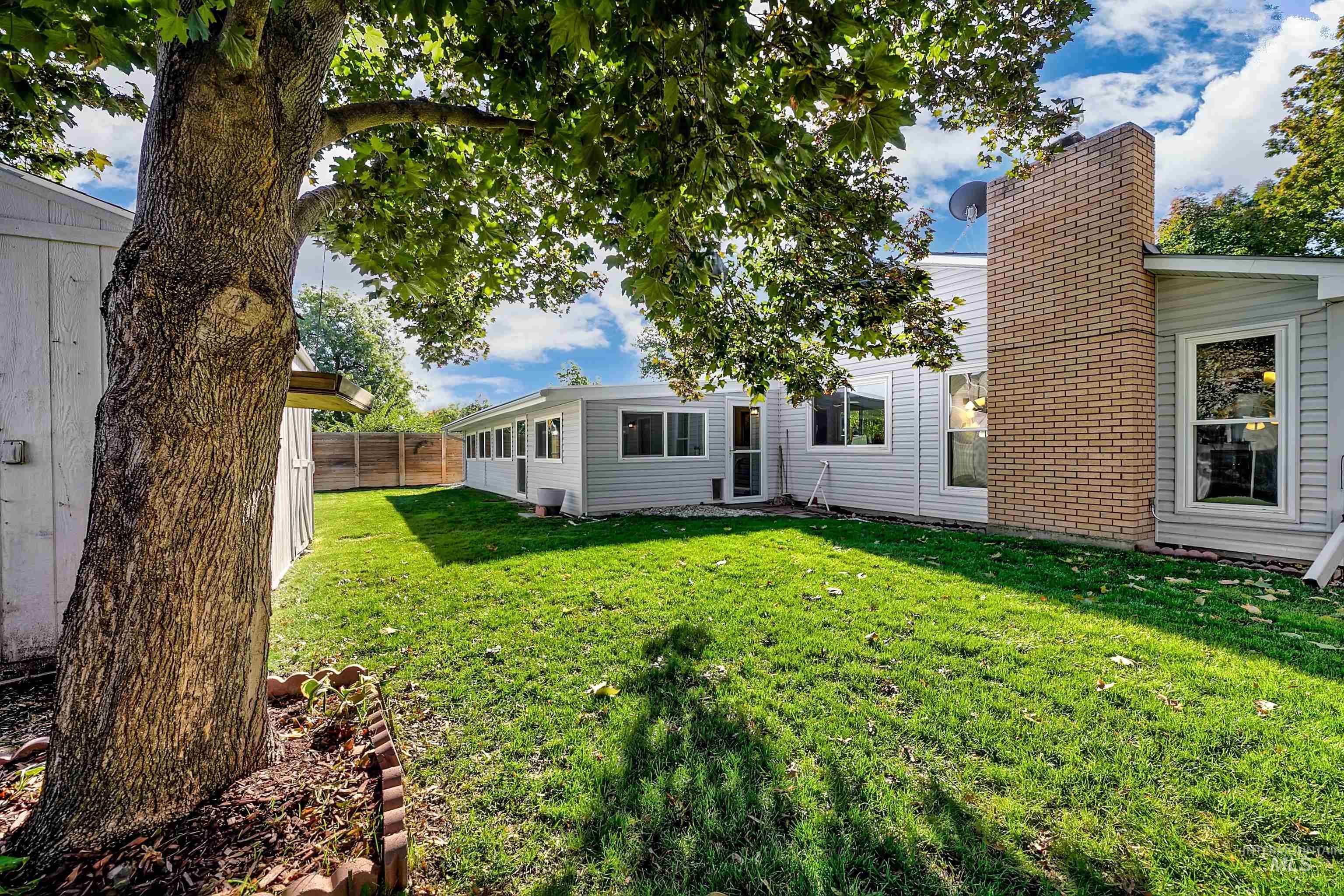 Rear view of house with a chimney