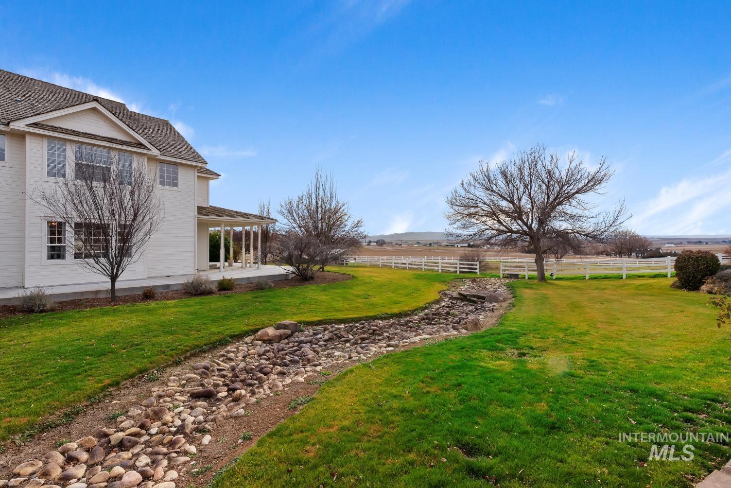 View of yard featuring a porch