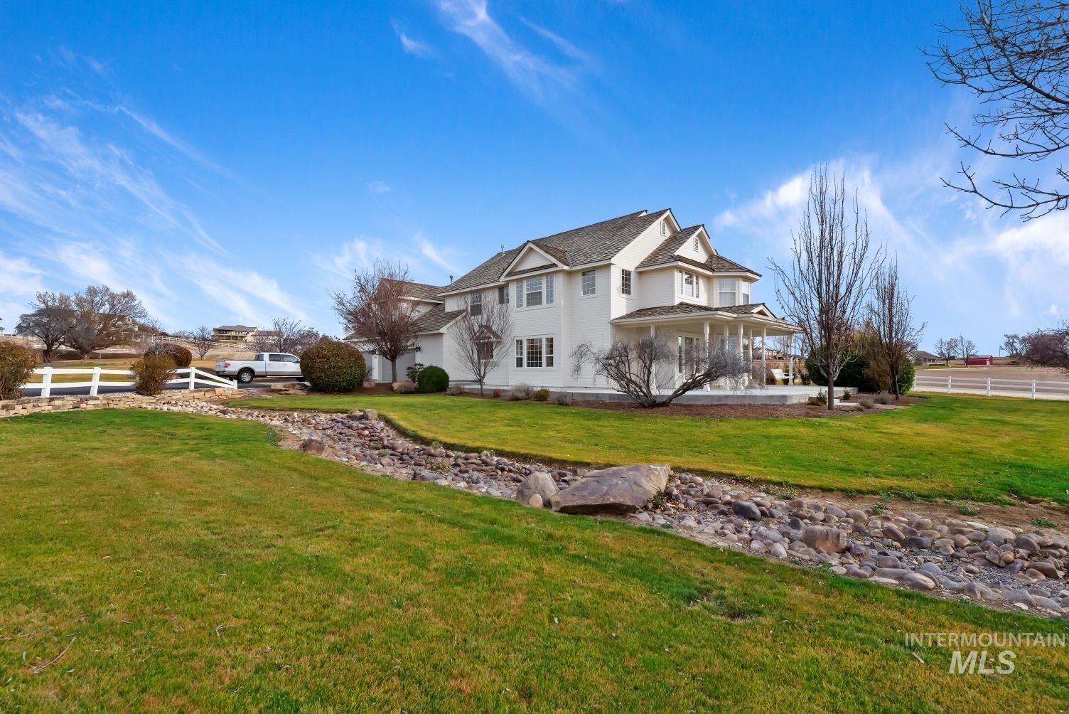 Rear view of house with a porch