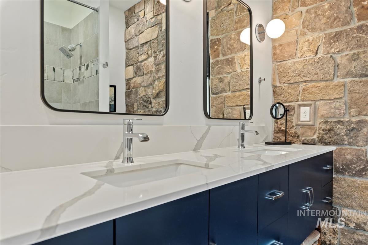 Full bathroom with double vanity