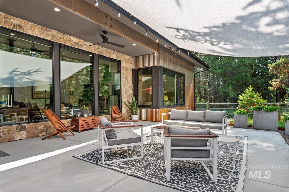 View of patio / terrace with outdoor lounge area and ceiling fan