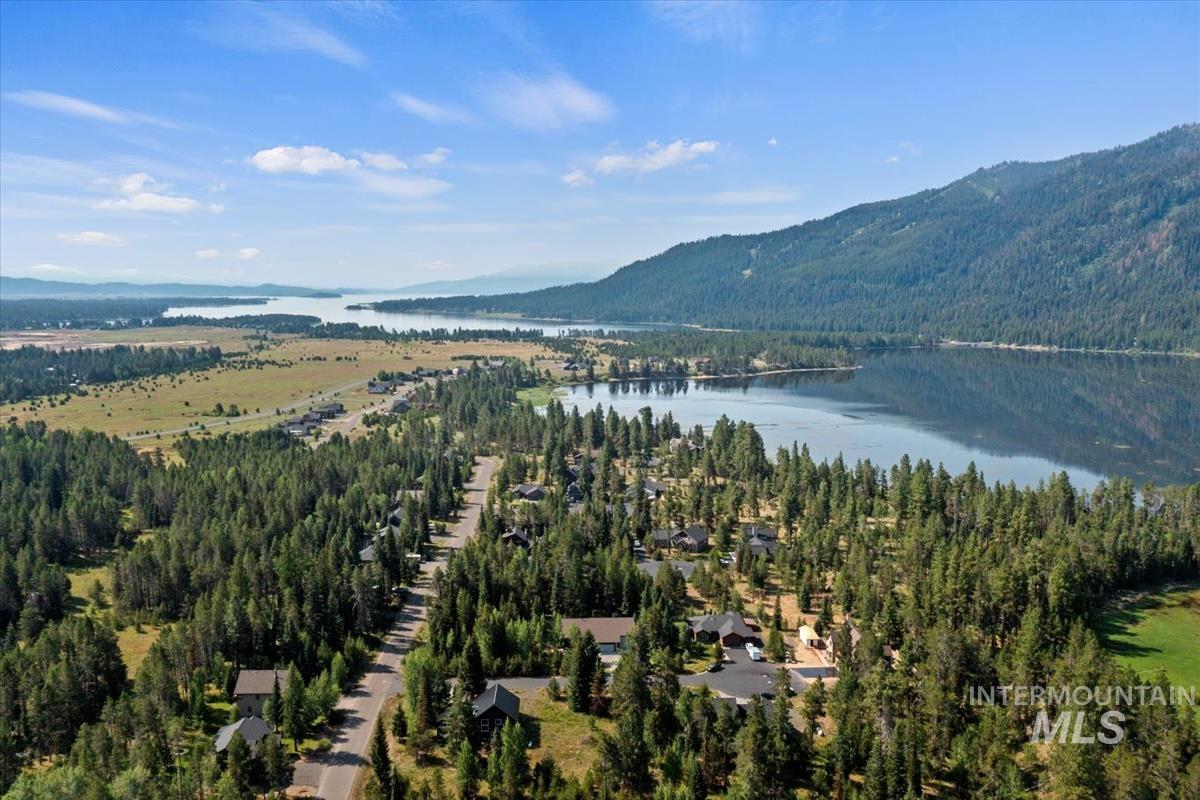 Bird's eye view of a water and mountain view, close Lake Cascade Access.