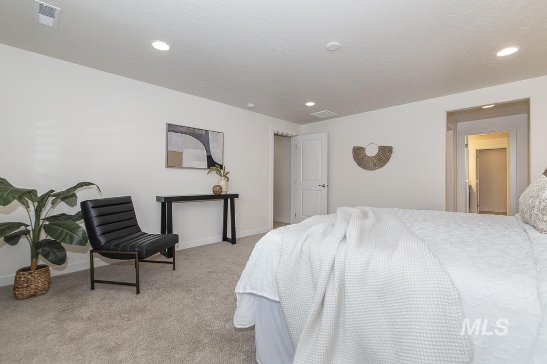 Bedroom with carpet and recessed lighting