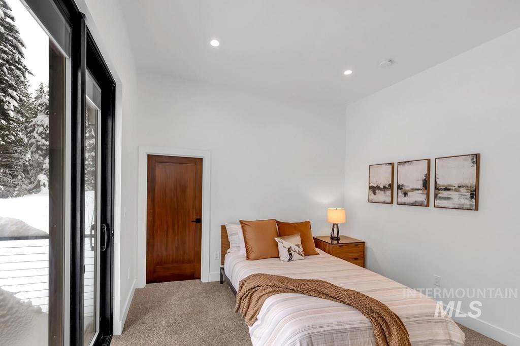 Bedroom featuring carpet floors and recessed lighting