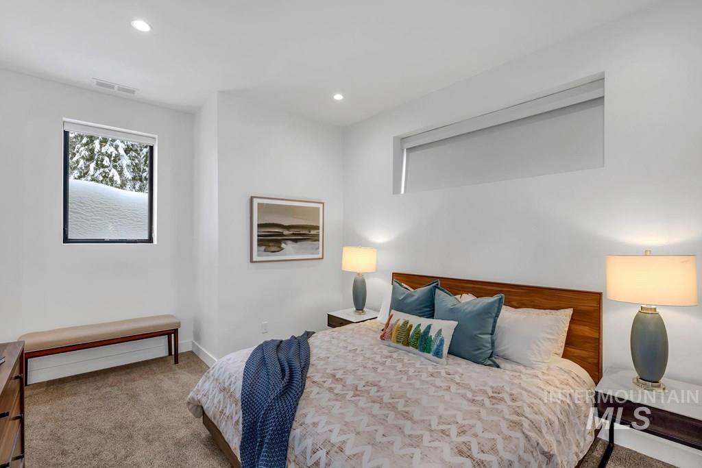 Bedroom featuring carpet floors and recessed lighting