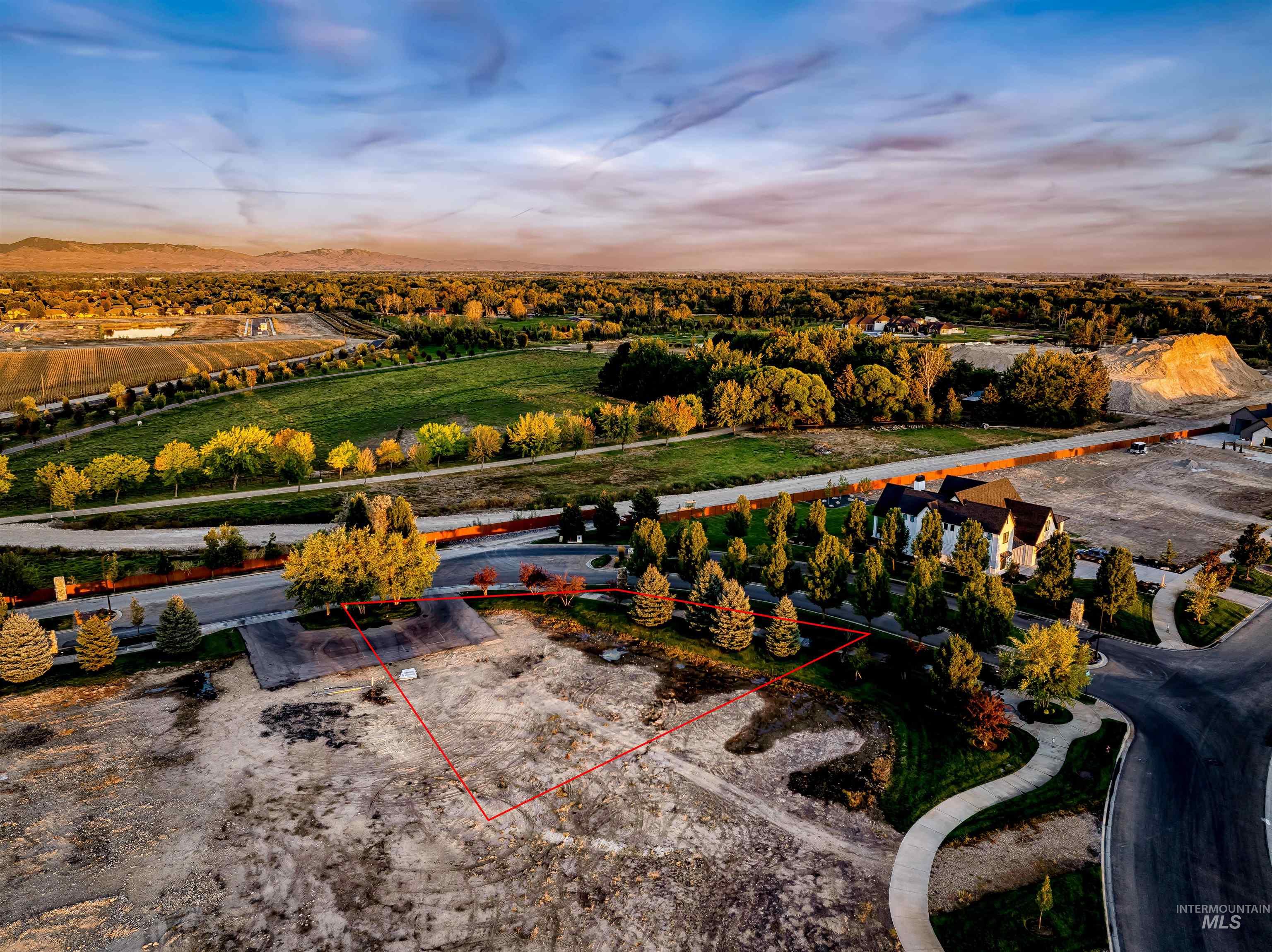 Aerial overview of property's location with property parcel outlined