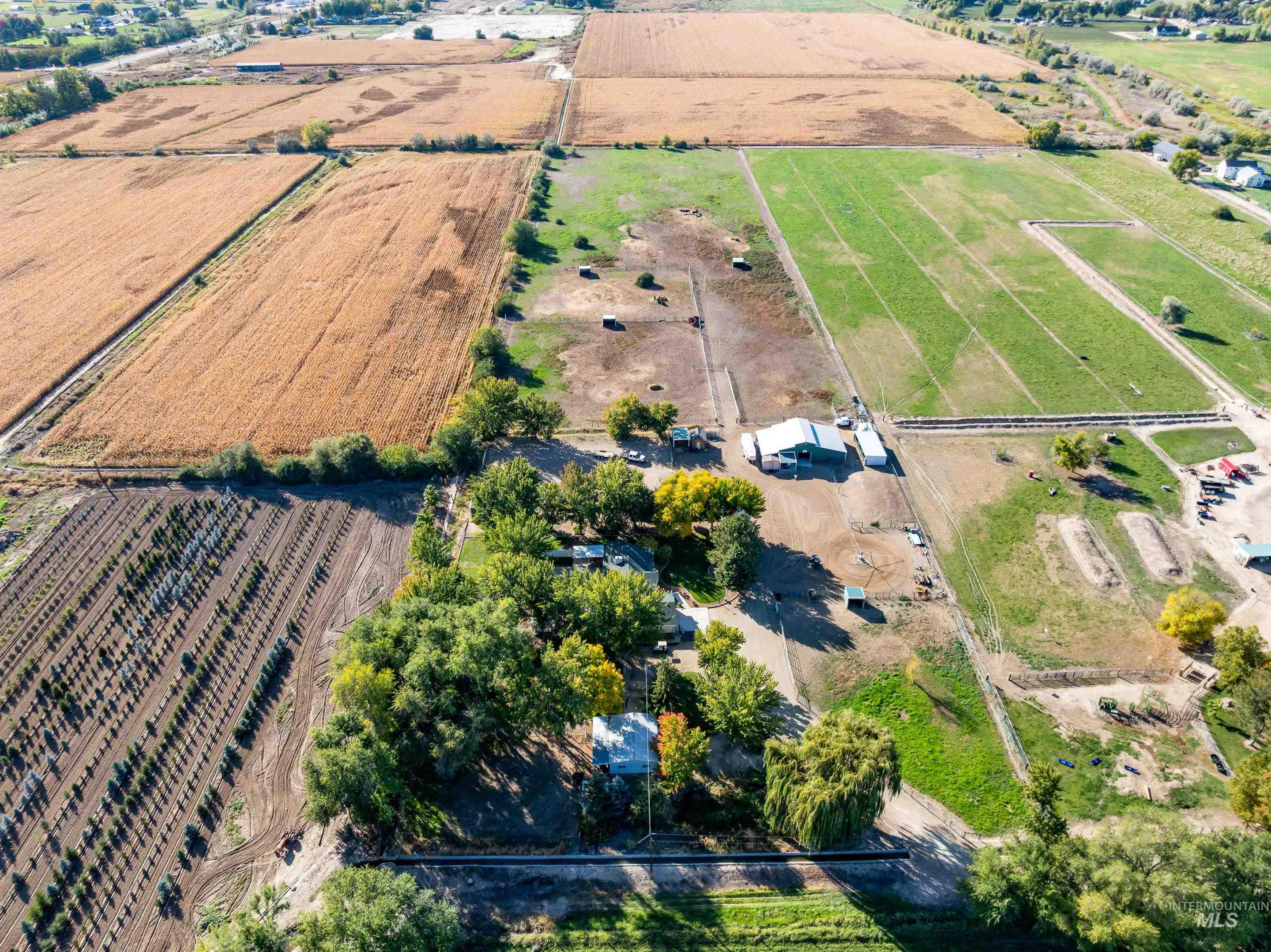 Aerial overview of property's location featuring rows of crops and rural landscape