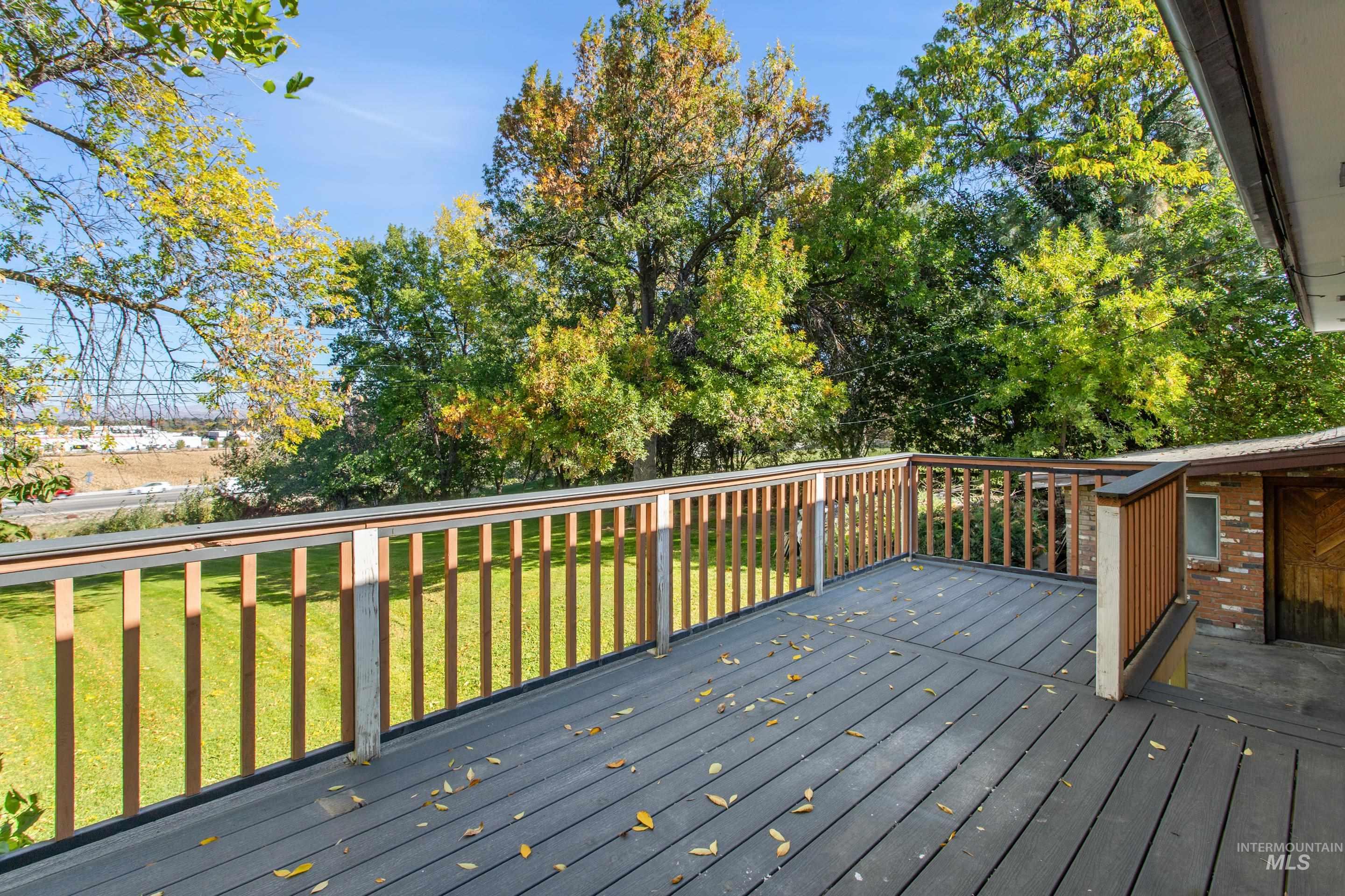 Wooden deck with a lawn