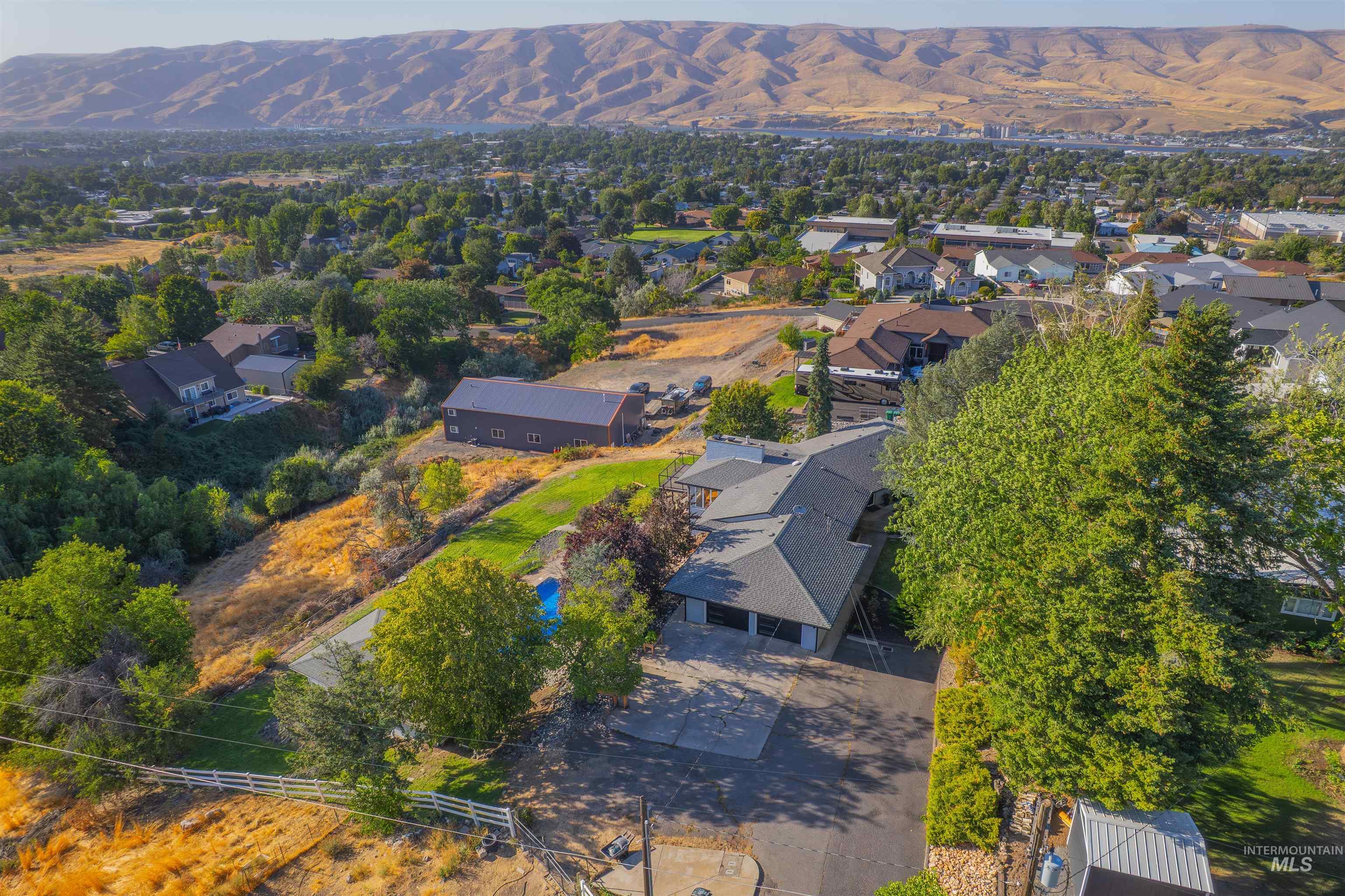 Aerial view of residential area with mountains