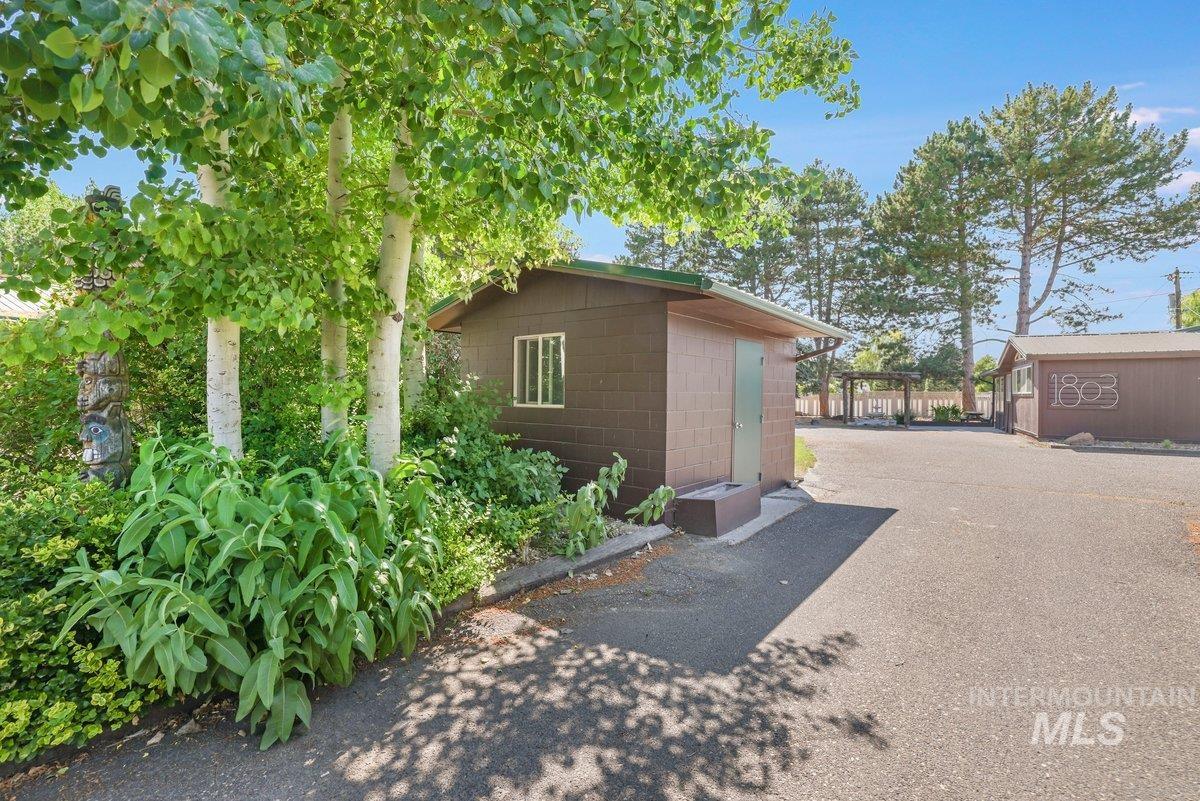 View of home's exterior featuring concrete block siding