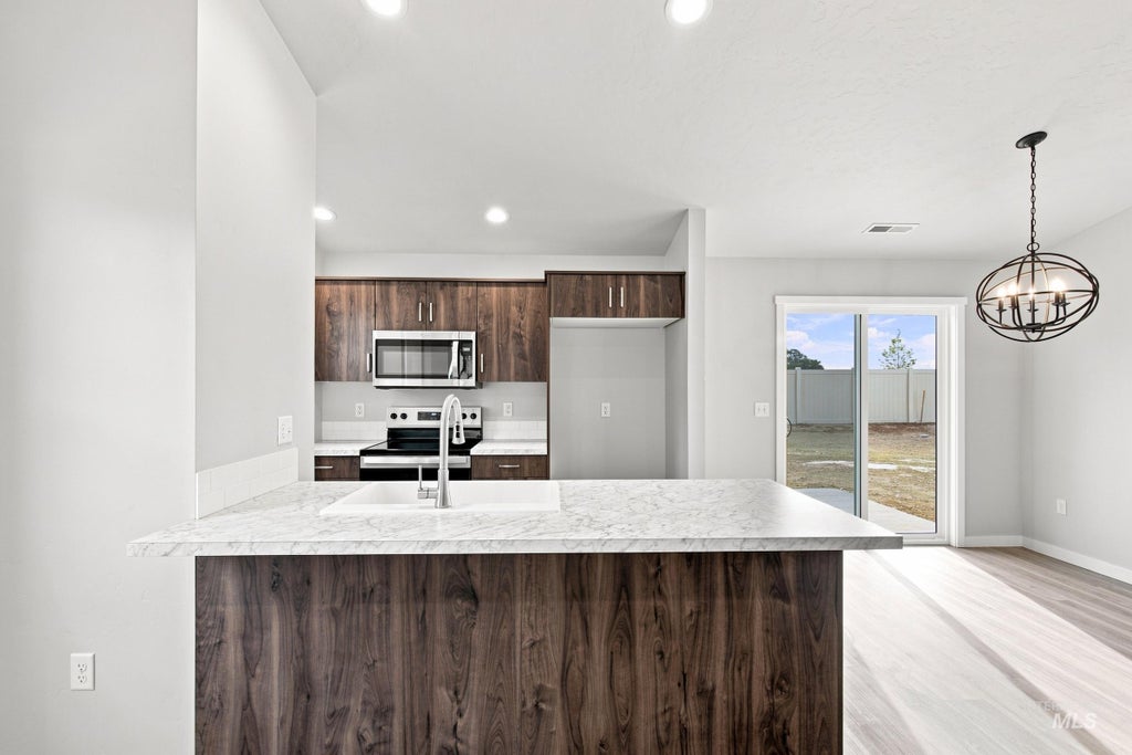 Photo of 13345 Bank St, Caldwell, ID 83607 (MLS # 99001377)
