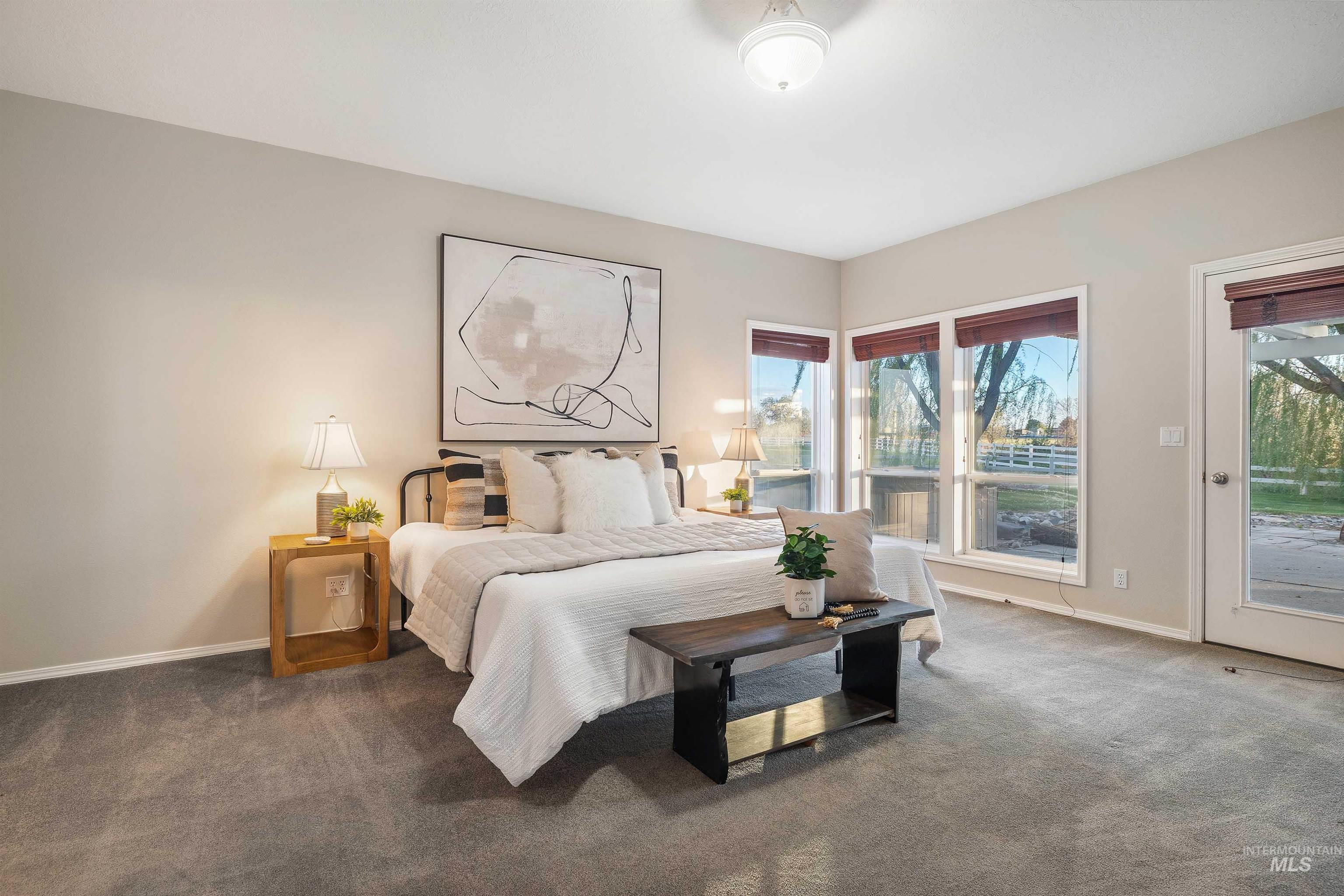 Soft gray carpeting throughout the room