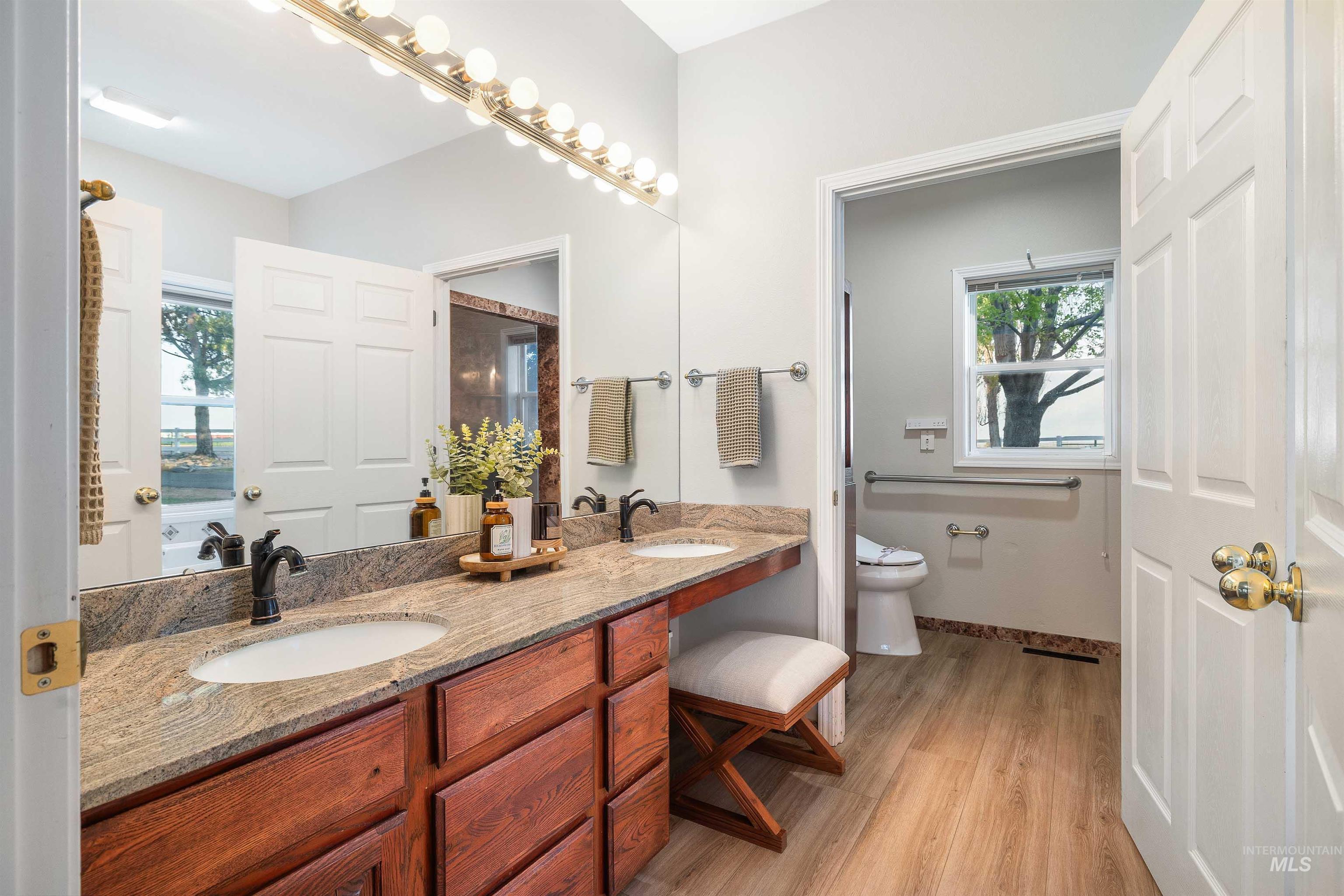 Dual vanity with granite countertop and integrated sinks