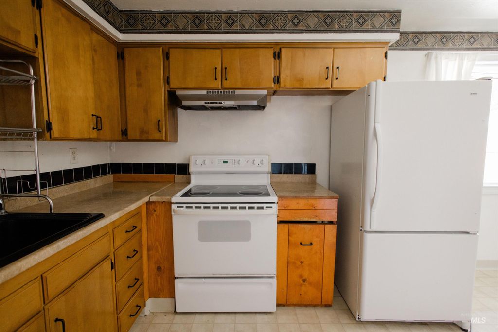 Photo of 950 E 16th N, Mountain Home, ID 83647 (MLS # 98986512)