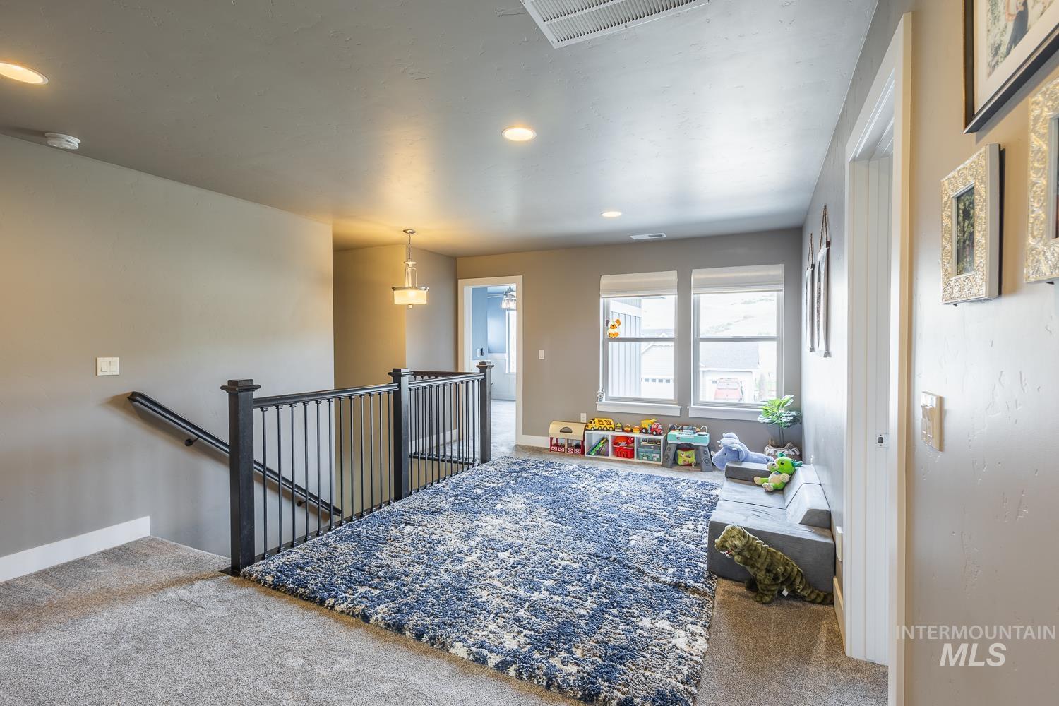 Playroom with carpet and recessed lighting