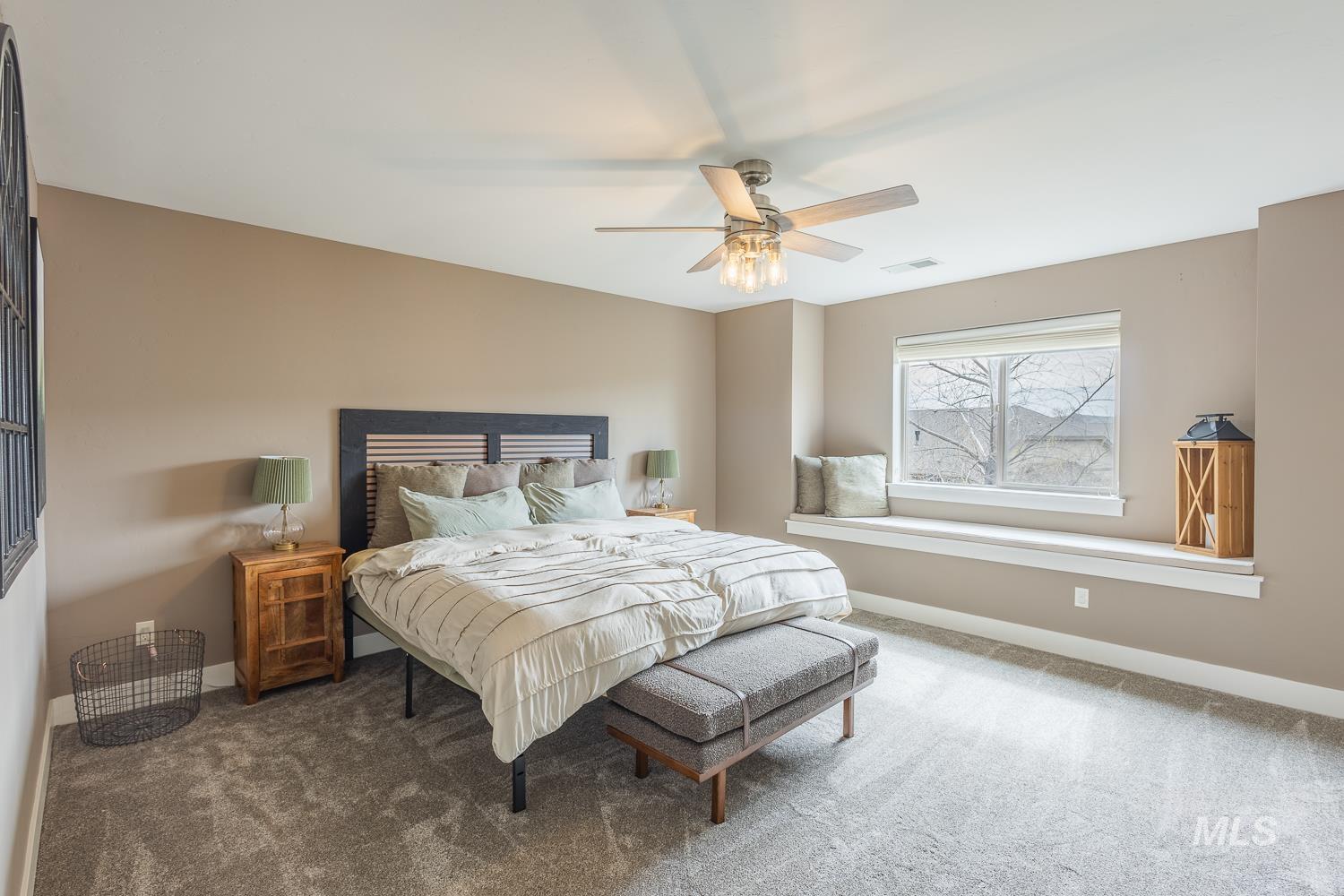 Bedroom with carpet floors and ceiling fan