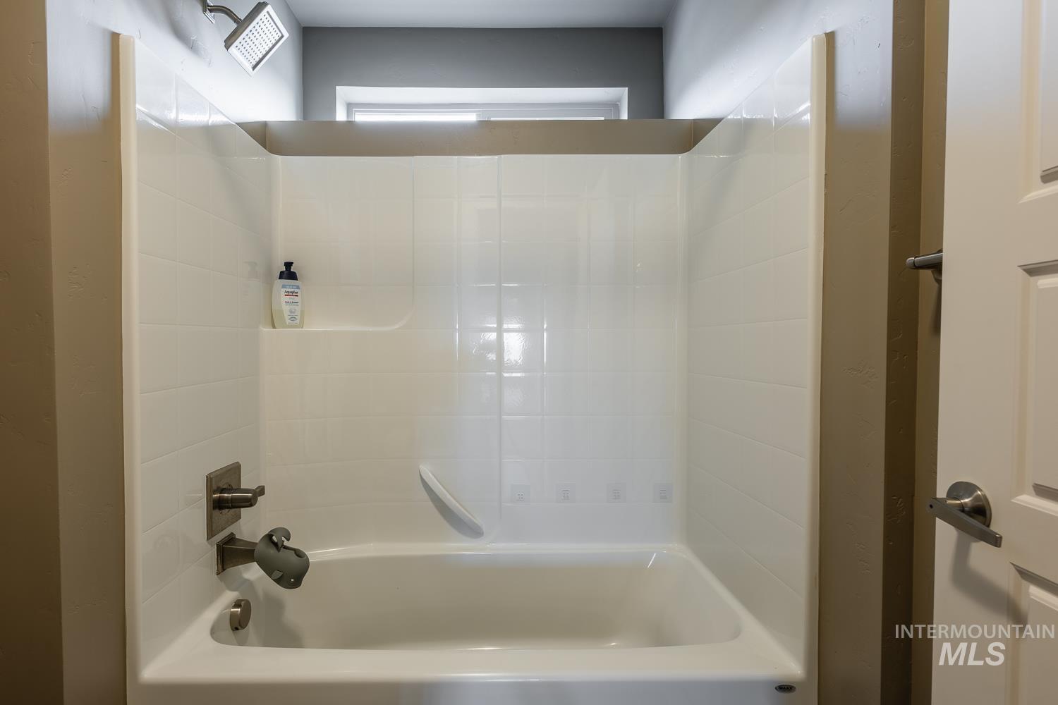 Bathroom featuring tub / shower combination