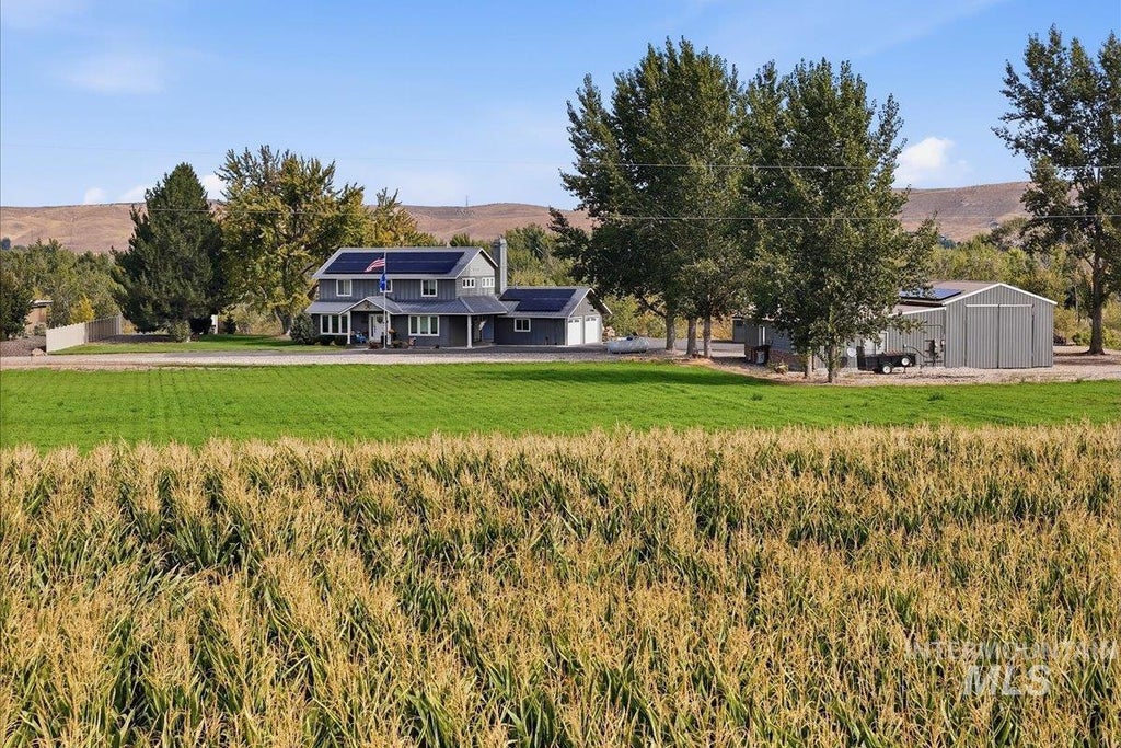 Photo of 7900 Elmore Rd, Fruitland, ID 83619 (MLS # 99001307)