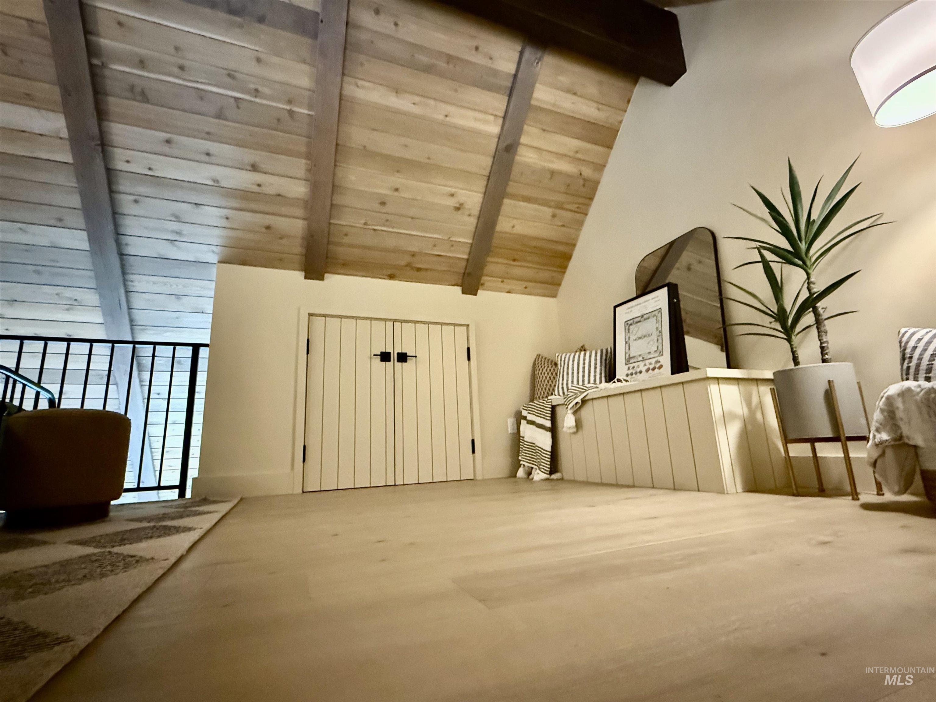 Bonus room with wooden ceiling