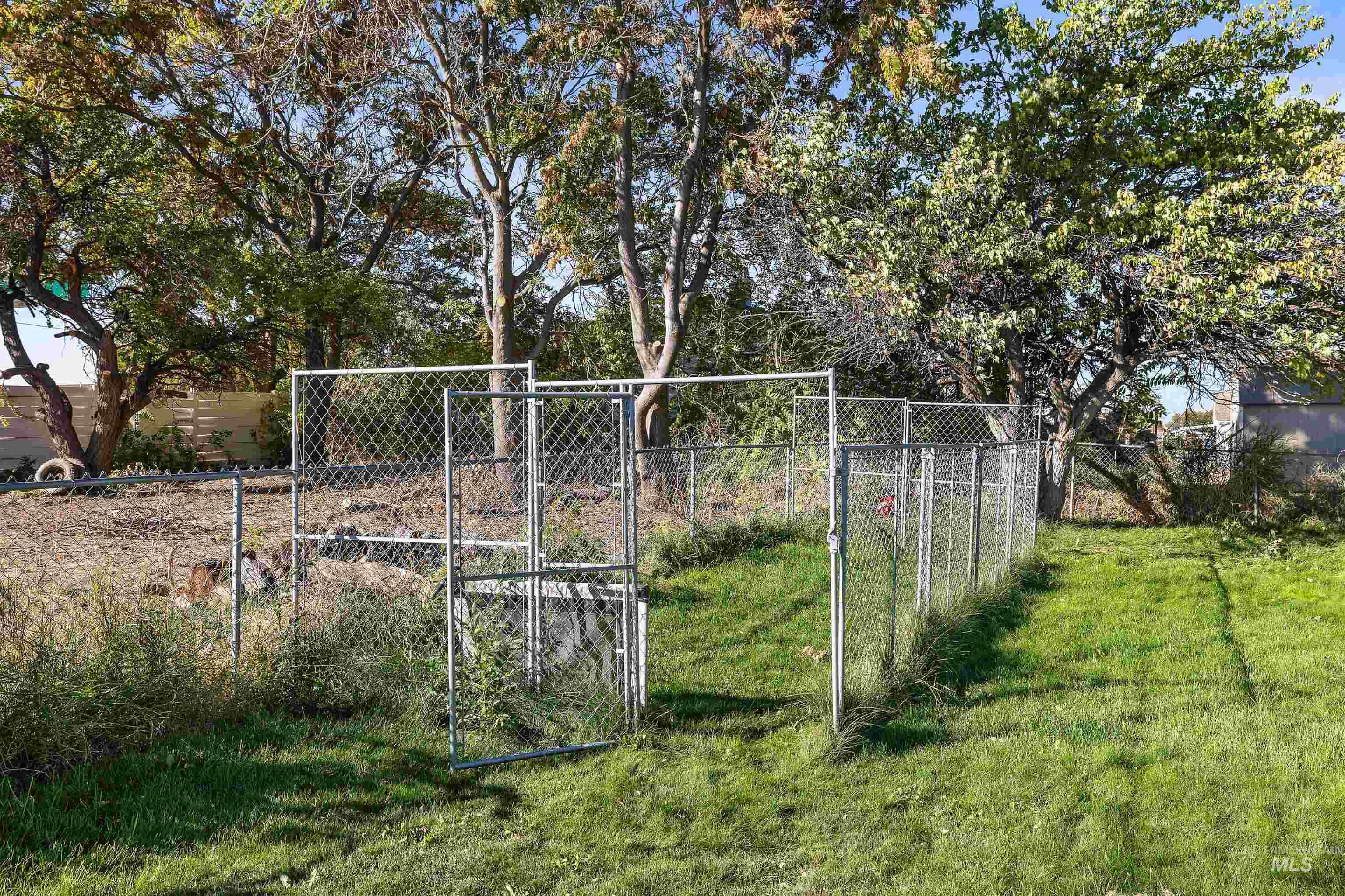 View of yard featuring a gate