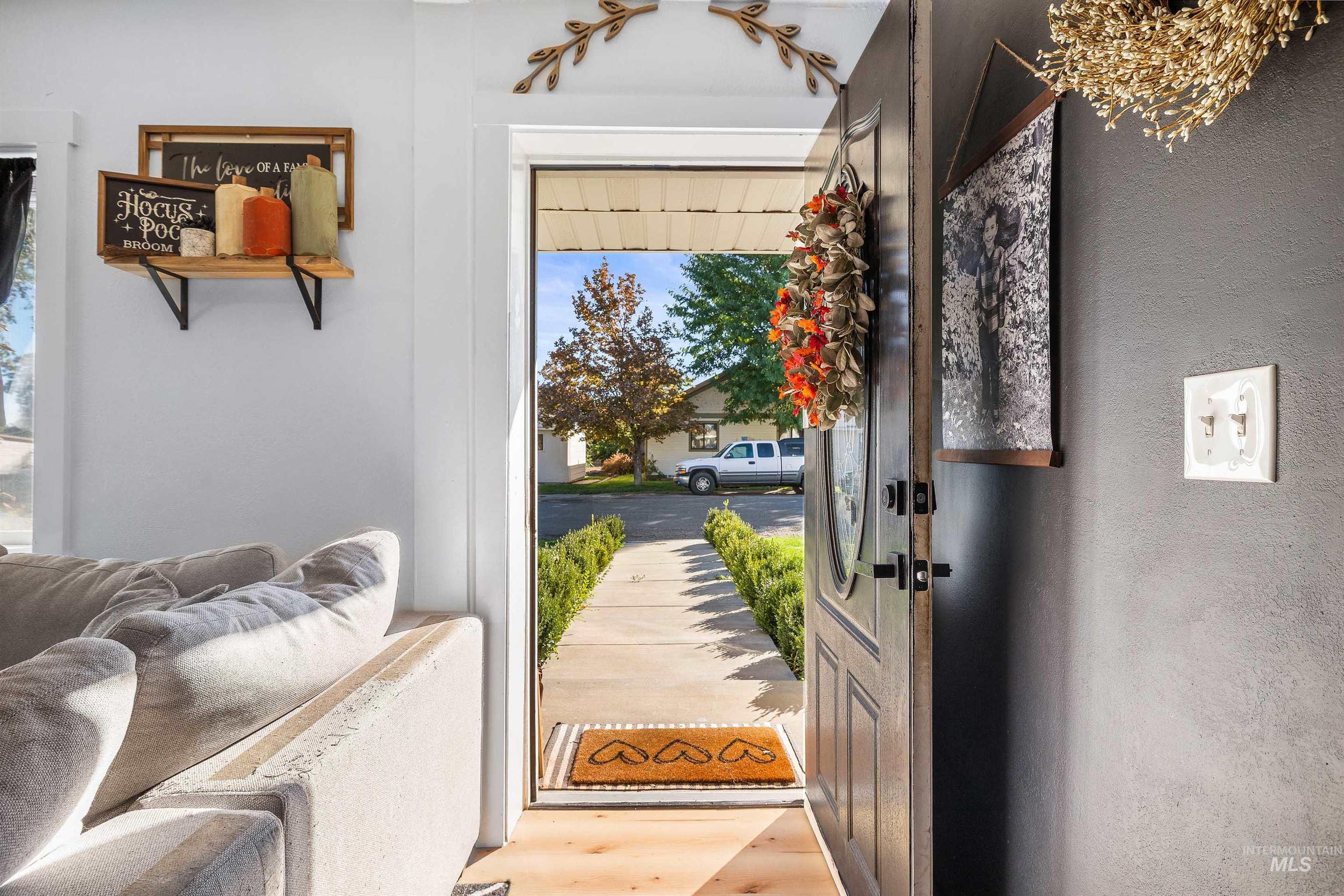 Entryway with light wood-style flooring