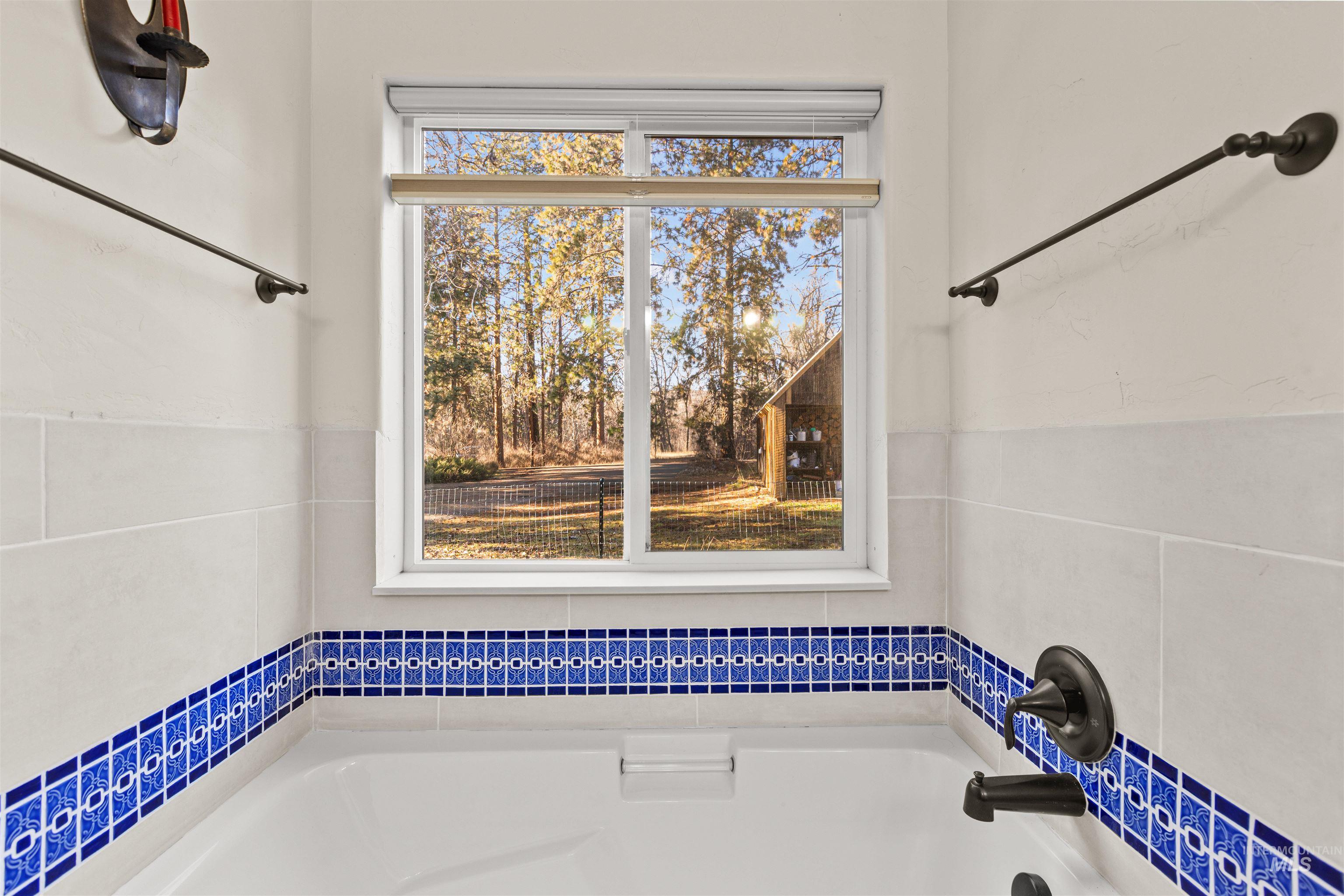 Full bath with a bath