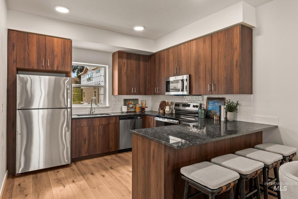 Photo of 7439 W Swain Lane, Garden City, ID 83714 (MLS # 98979612)