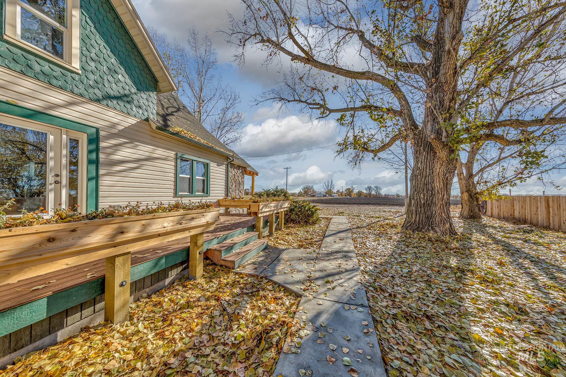 View of yard with a wooden deck
