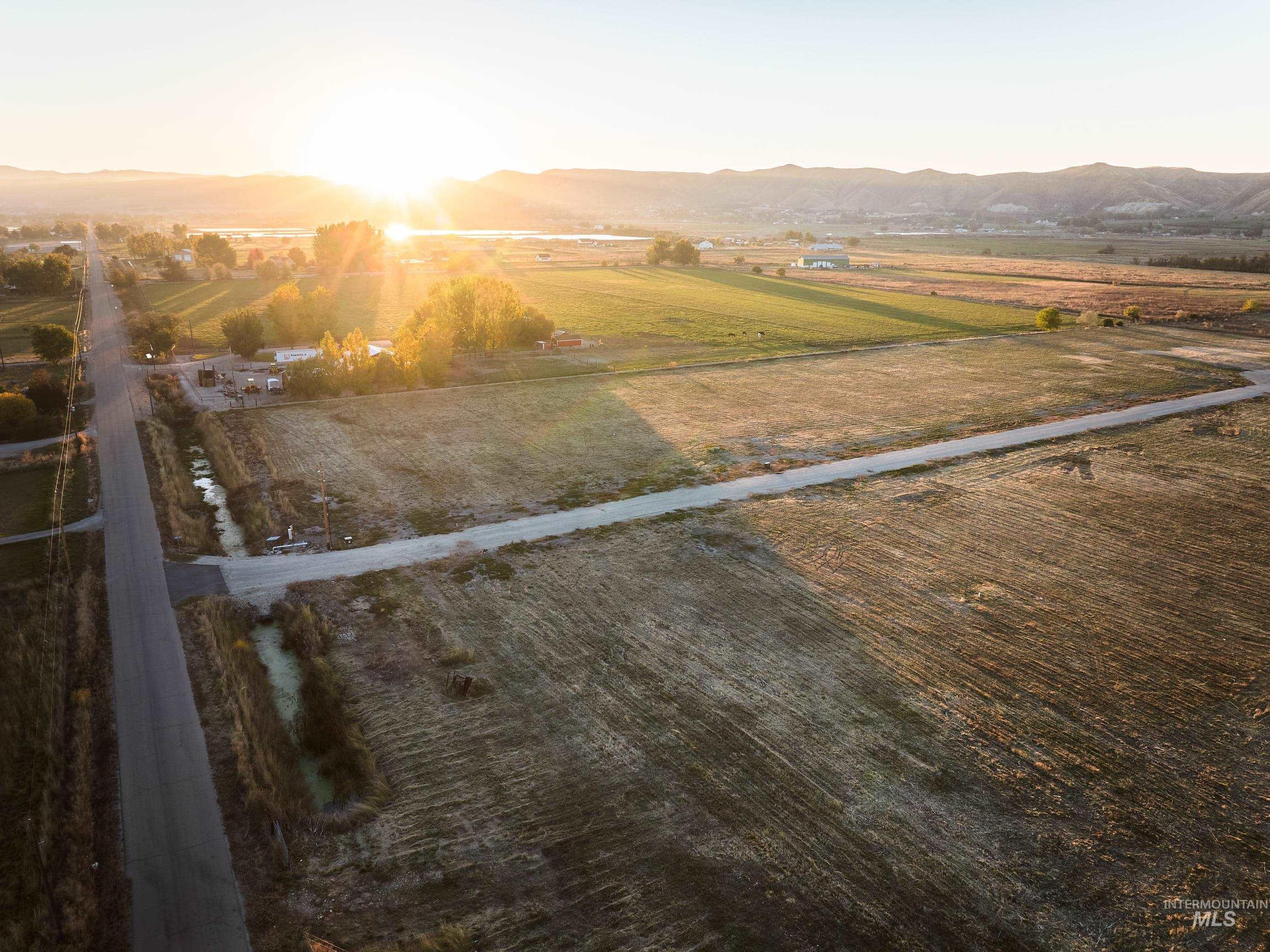 Mountain view with rural landscape and rows of crops