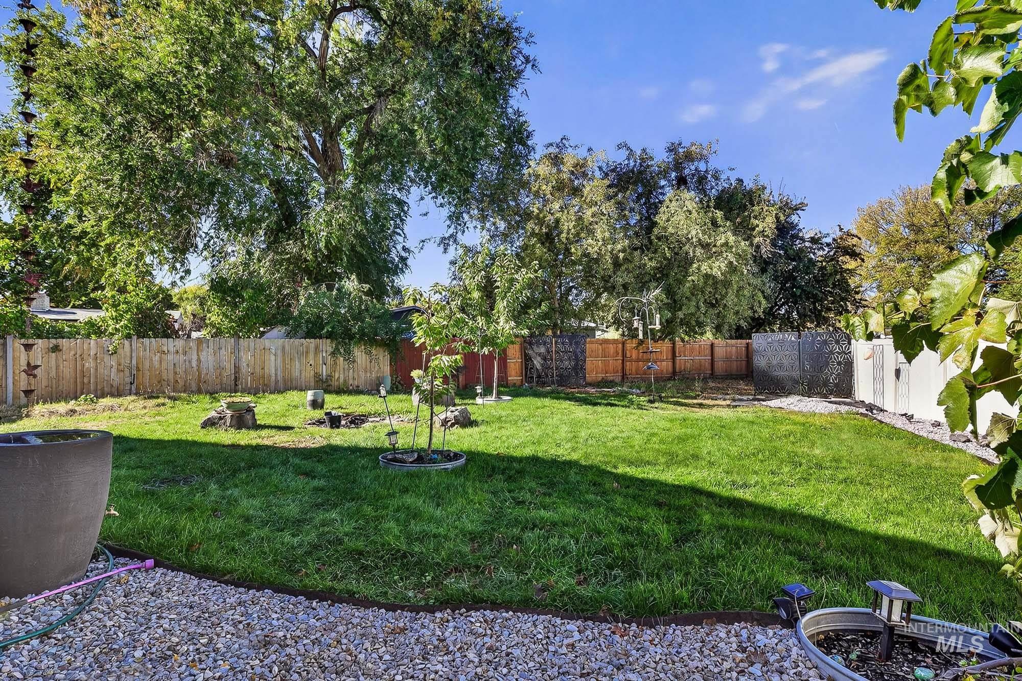 View of fenced backyard
