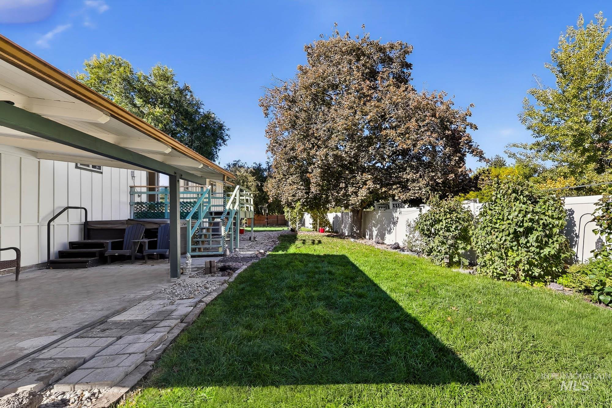 Fenced backyard featuring a patio area