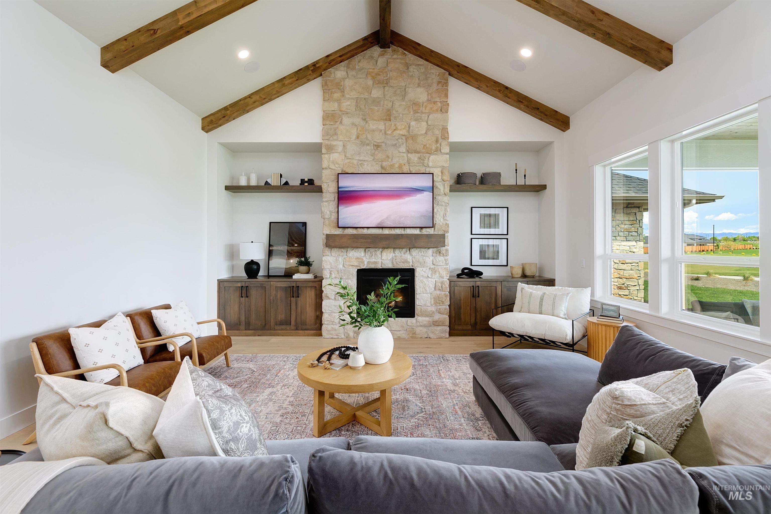 Living room featuring wood finished floors and a fireplace