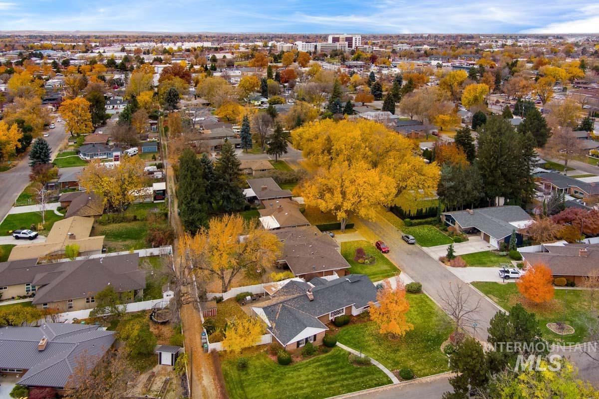 Aerial overview of property's location with nearby suburban area