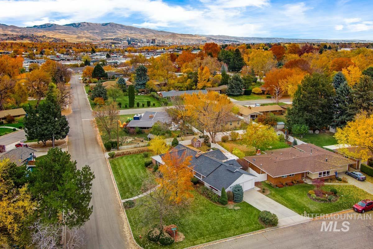 Aerial perspective of suburban area featuring mountains