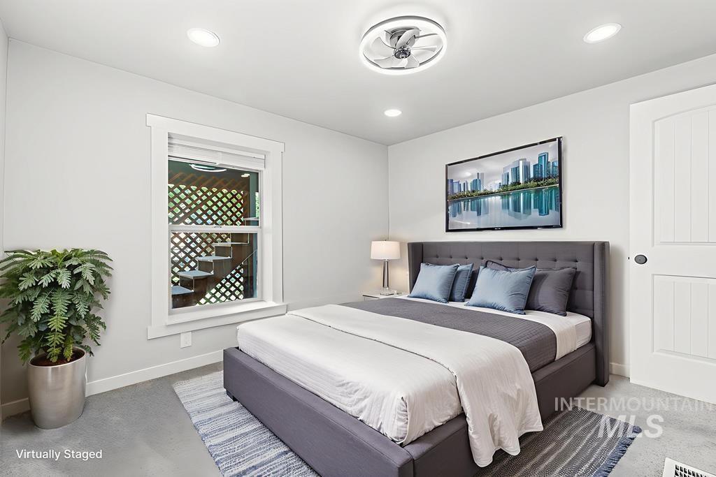 Bedroom with recessed lighting
