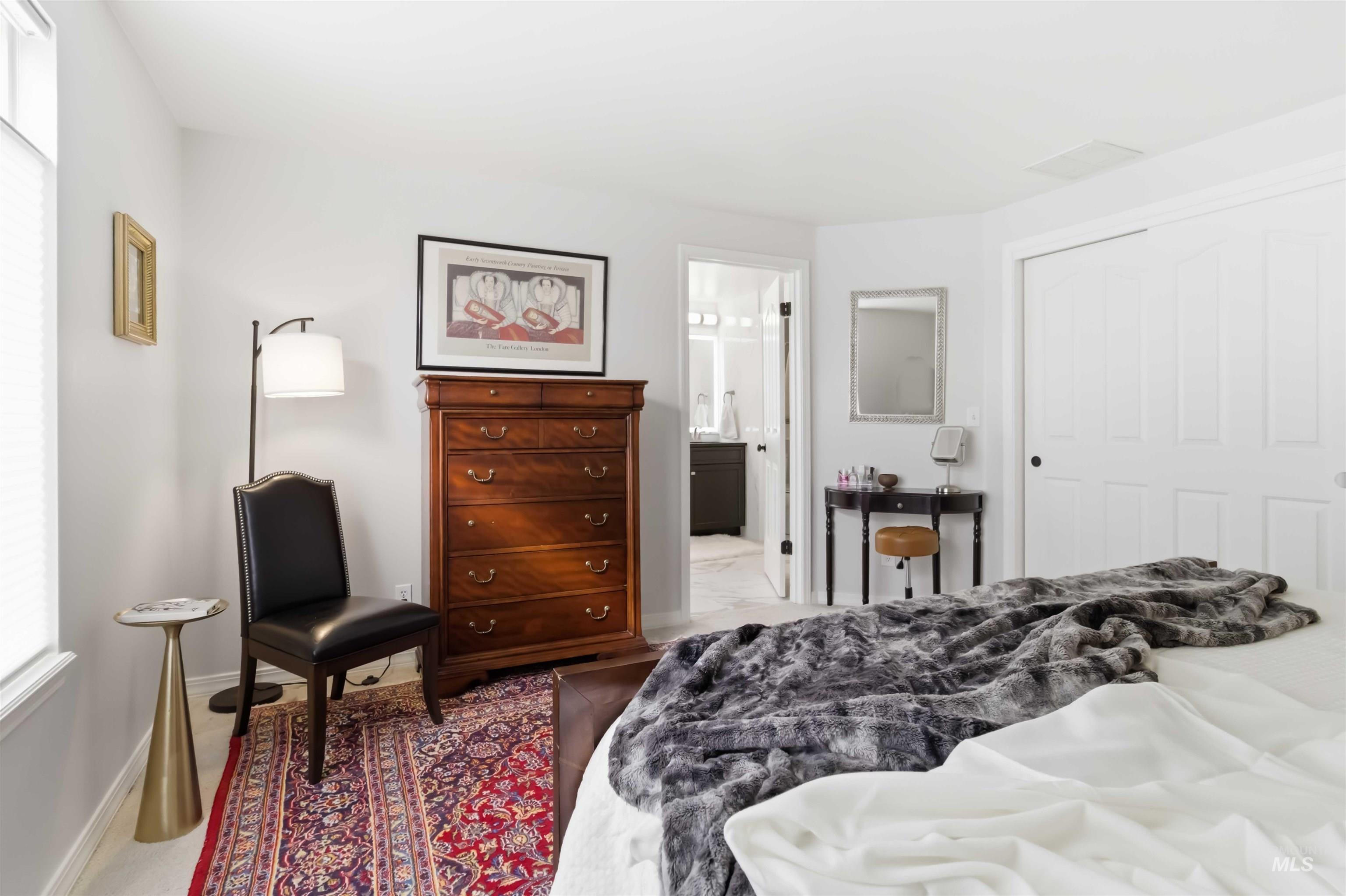 Bedroom with baseboards and a closet
