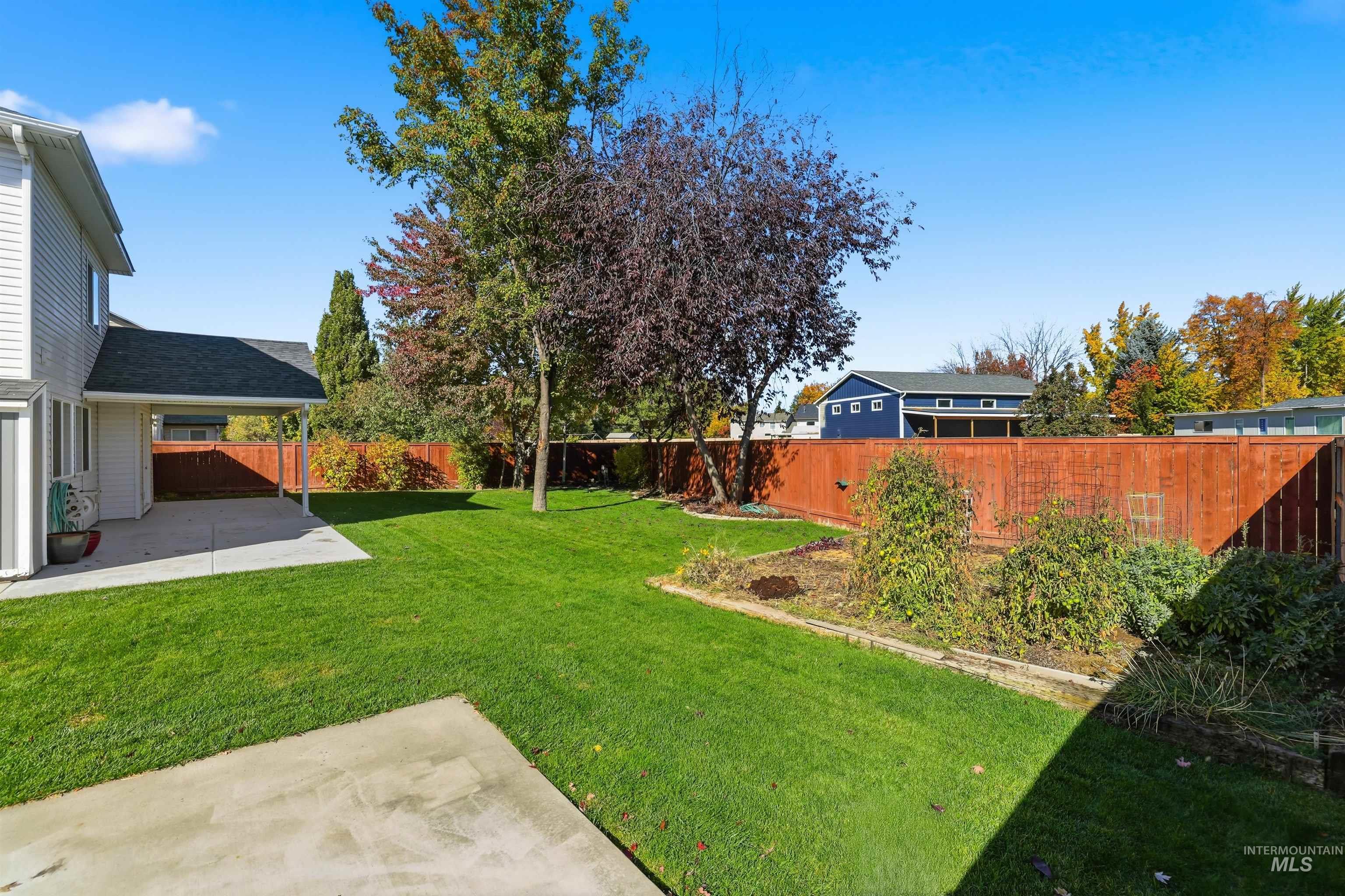 Fenced backyard featuring a patio area