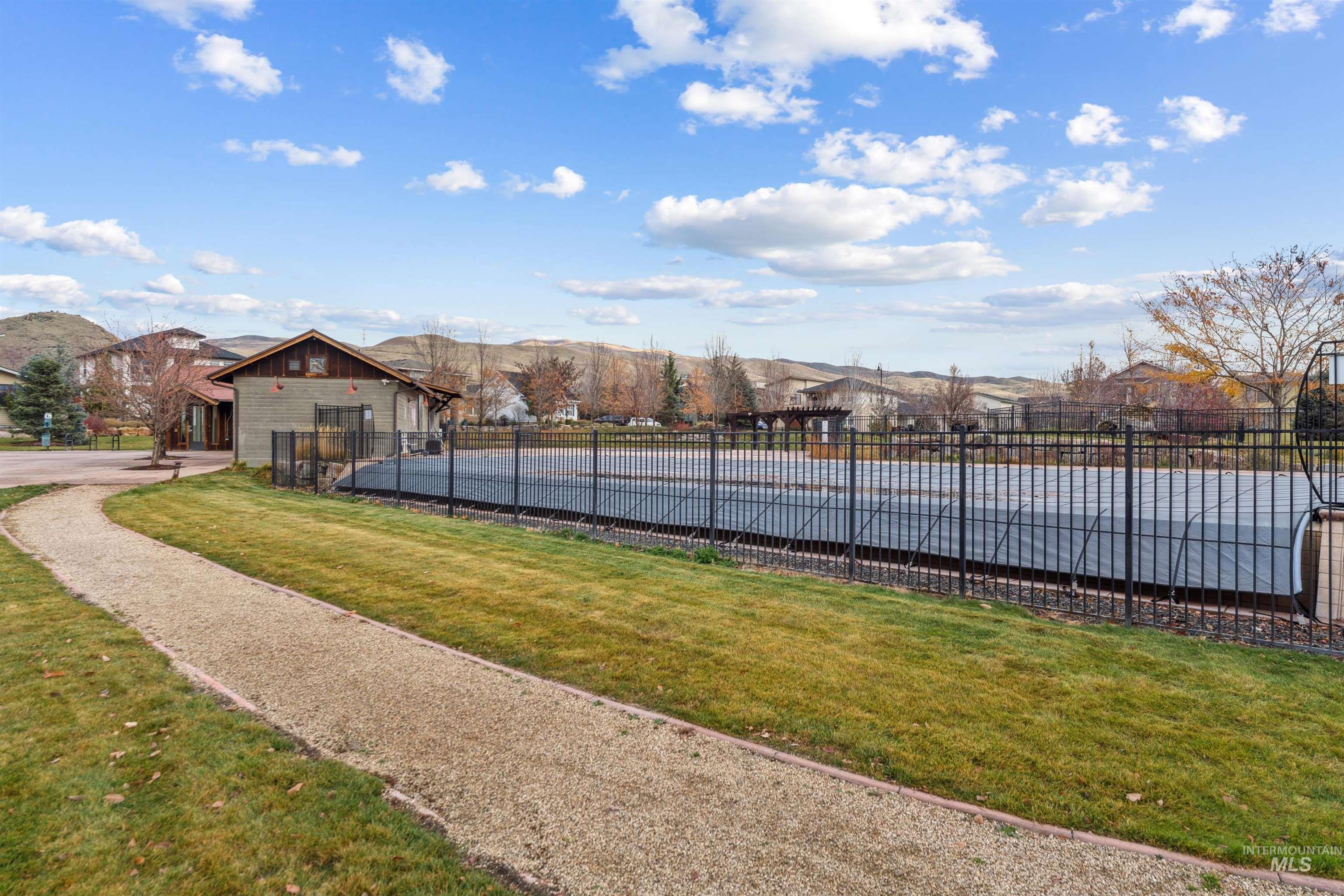View of swimming pool featuring a mountain view