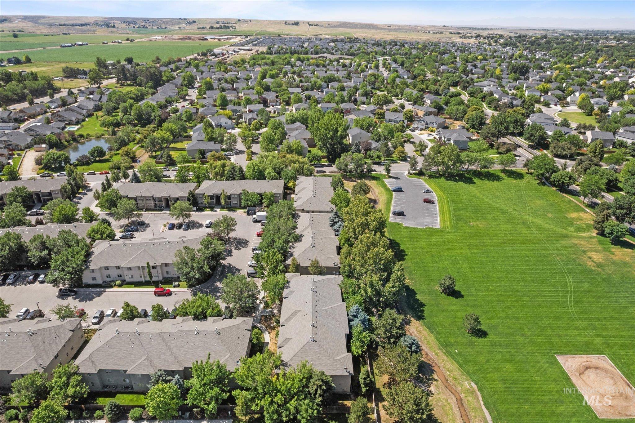 Aerial overview of property's location with nearby suburban area