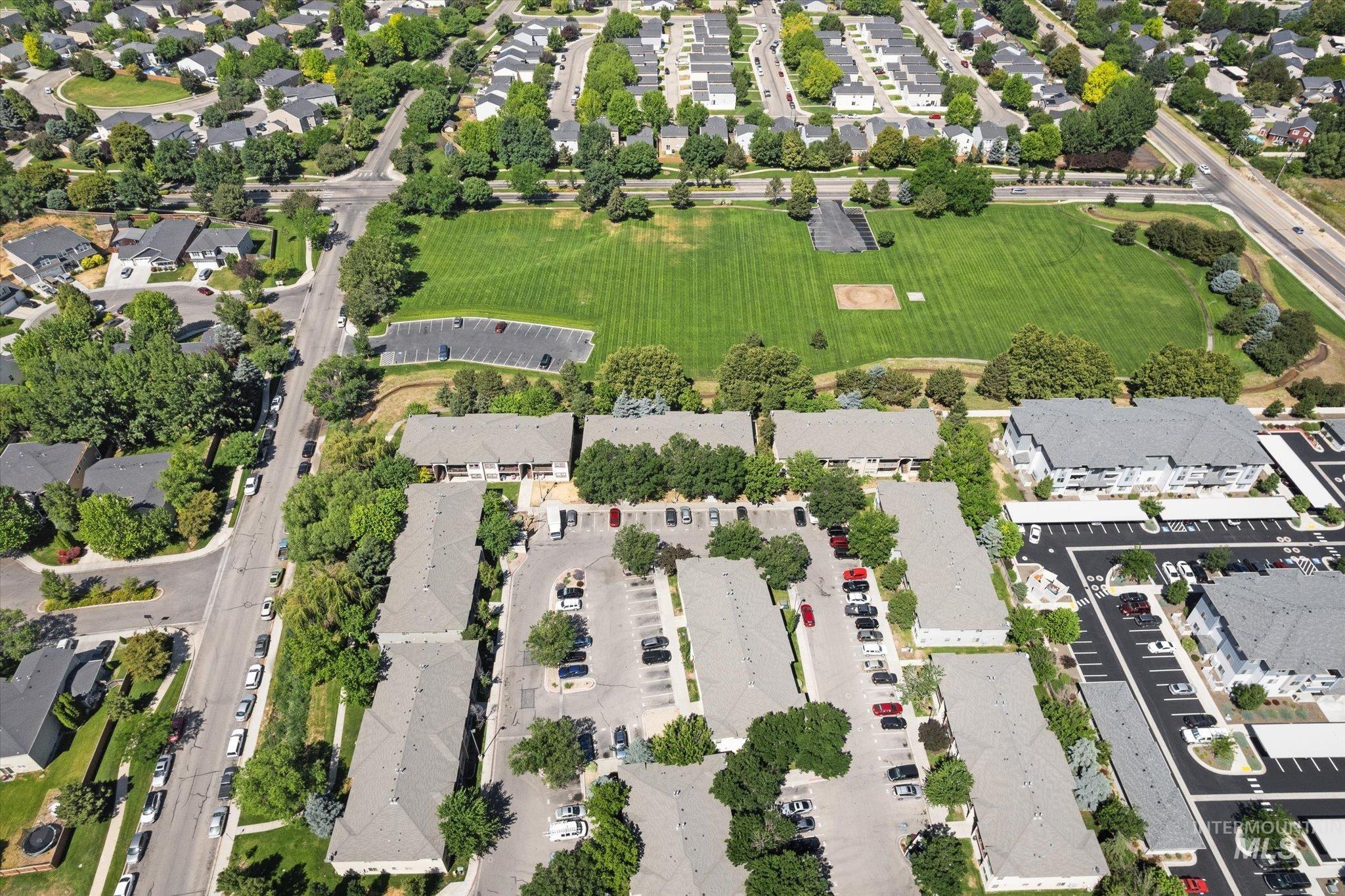 View of property location with nearby suburban area