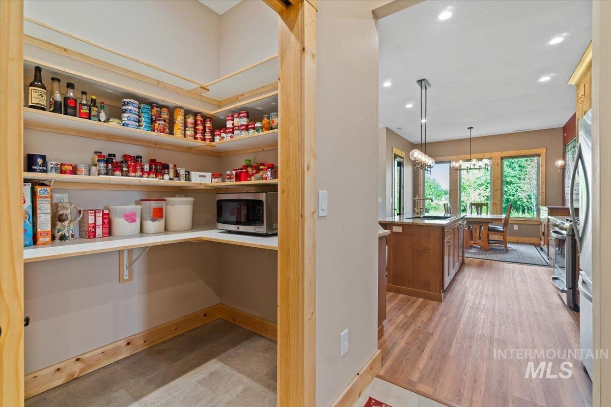 Pantry featuring a sink