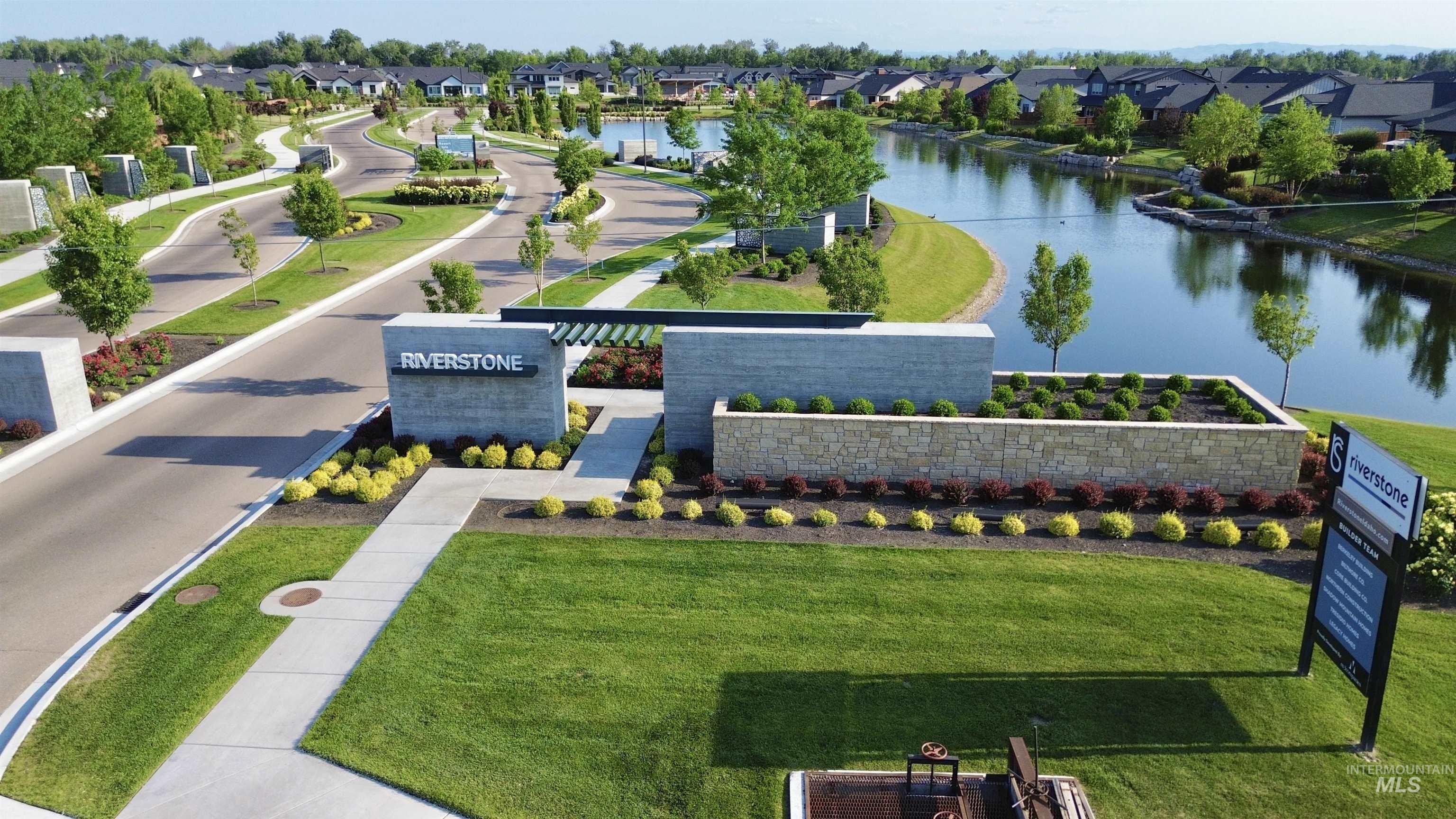 Aerial view of residential area with a nearby body of water