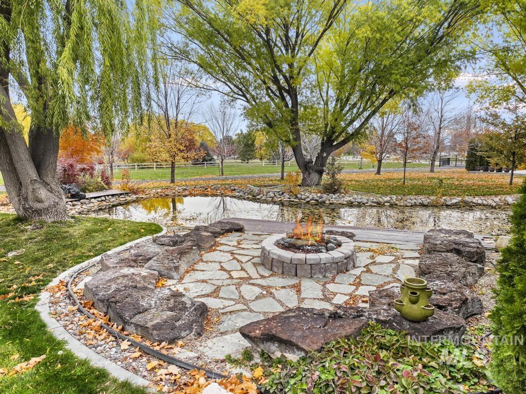 View of patio / terrace with a fire pit