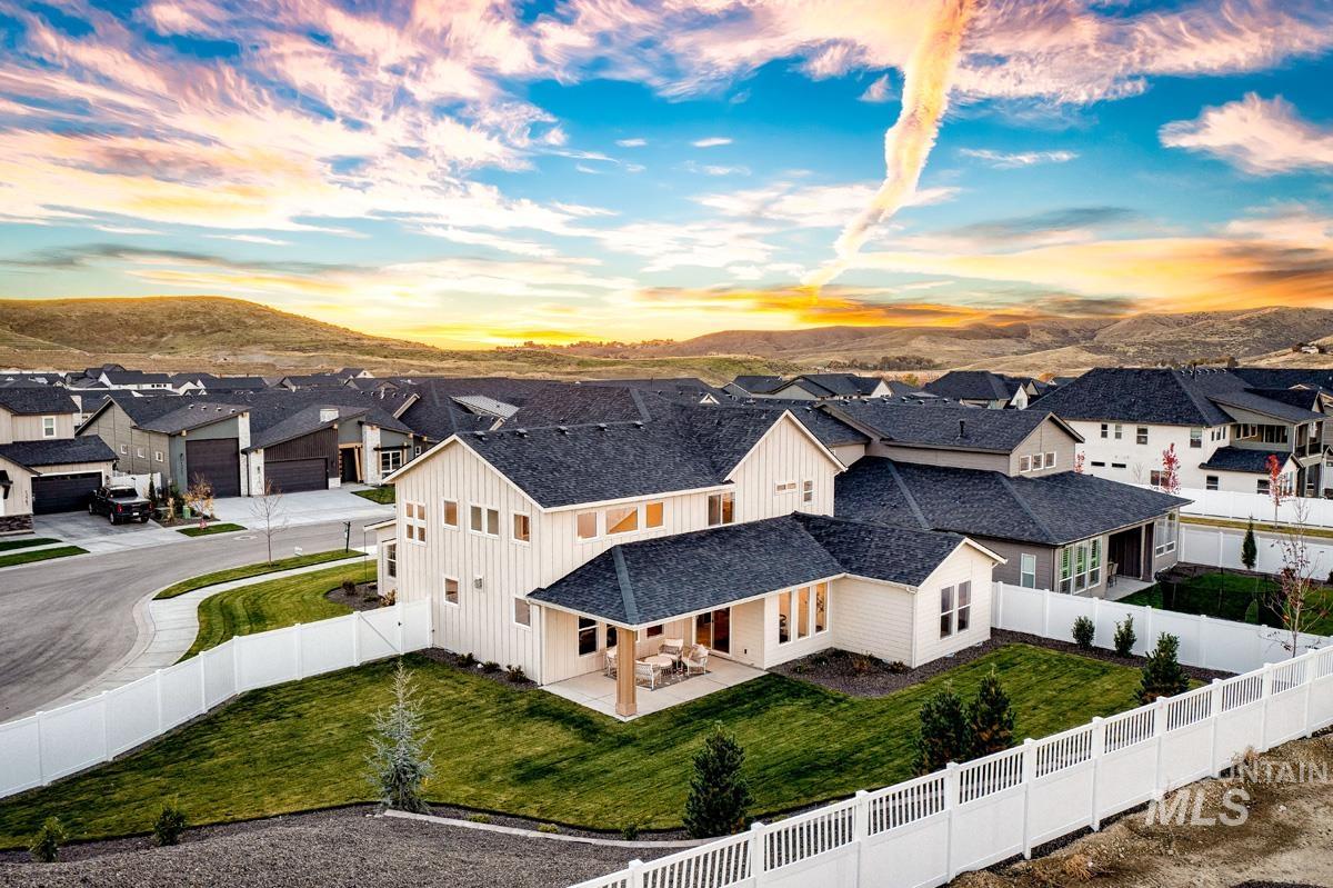Aerial view of residential area with a mountainous background