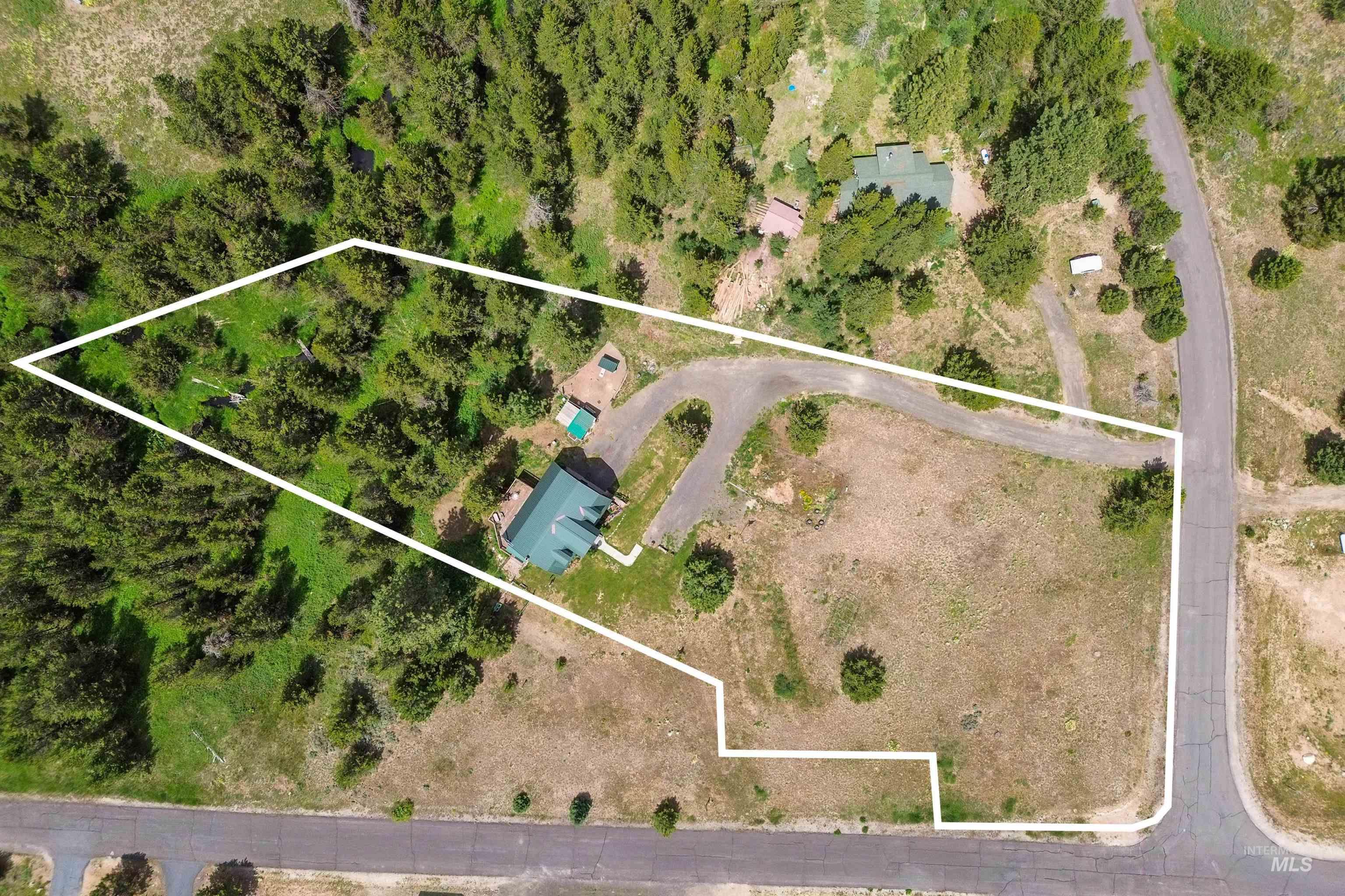Aerial view of property's location featuring property parcel outlined