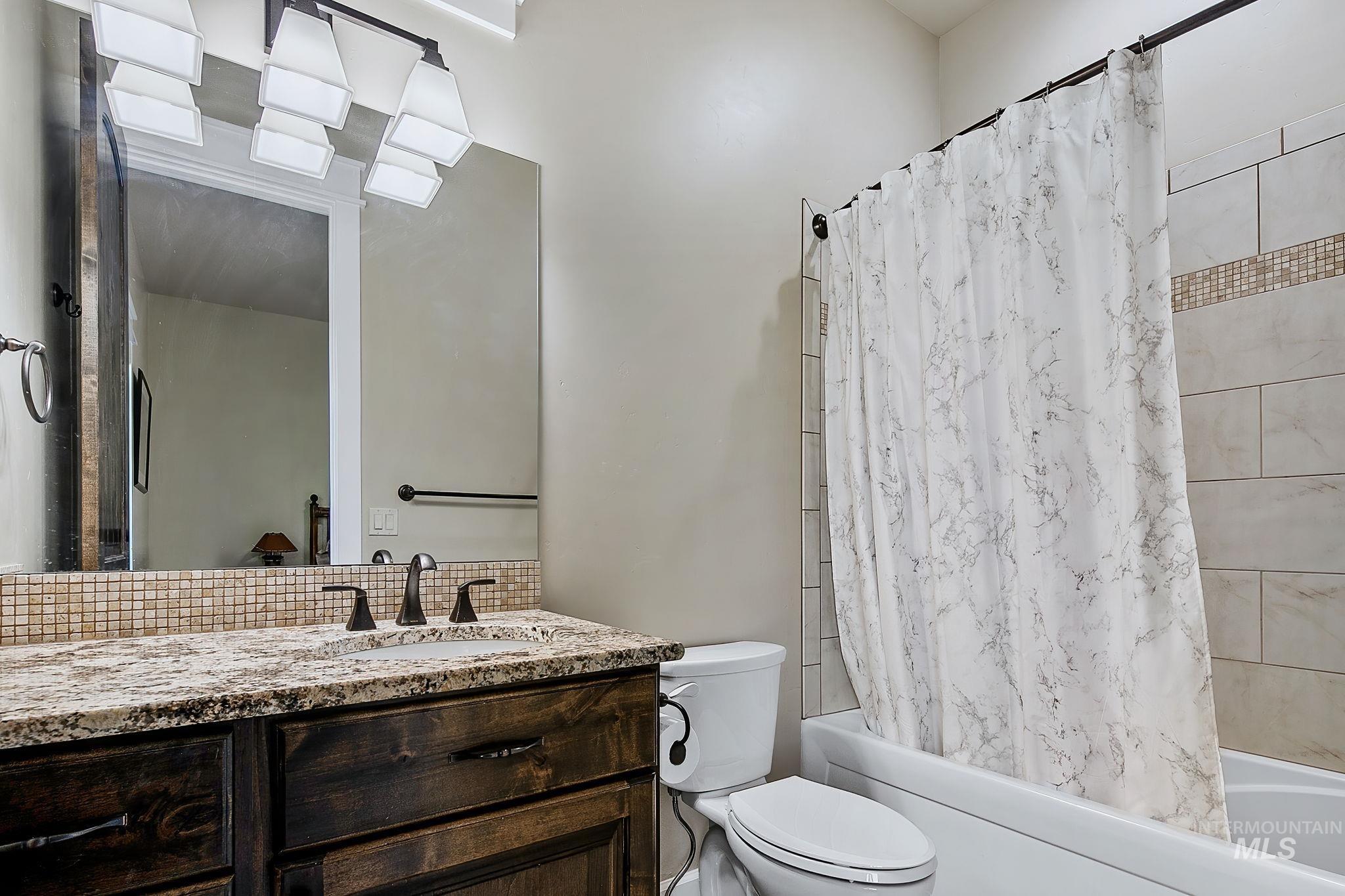Main level bedroom en suite bathroom