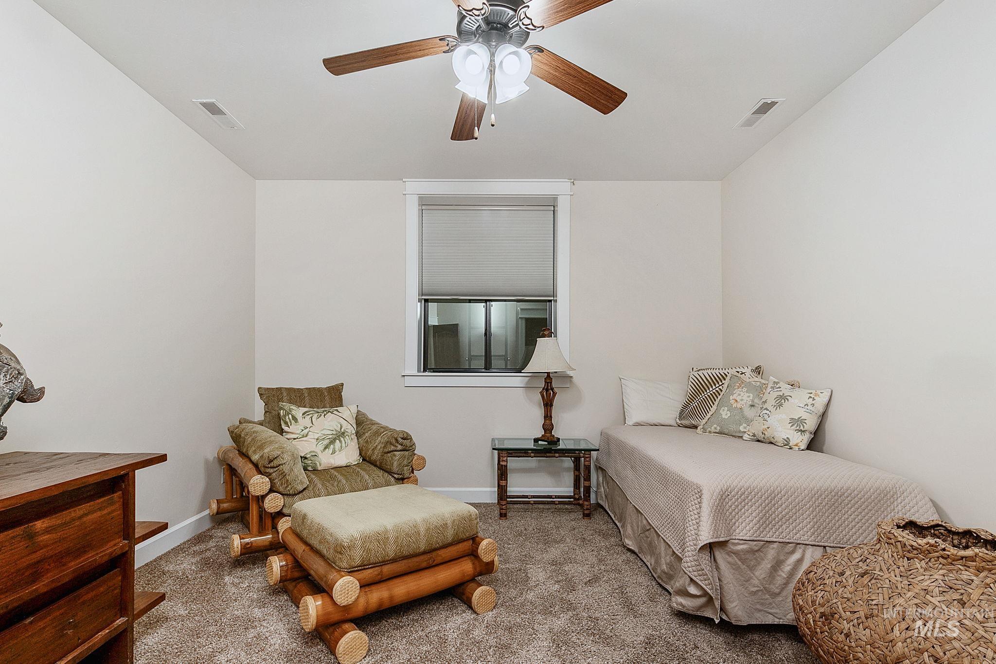 Additional lower-level en suite bedroom offering privacy and comfort for guests, complete with its own full bathroom and spacious layout