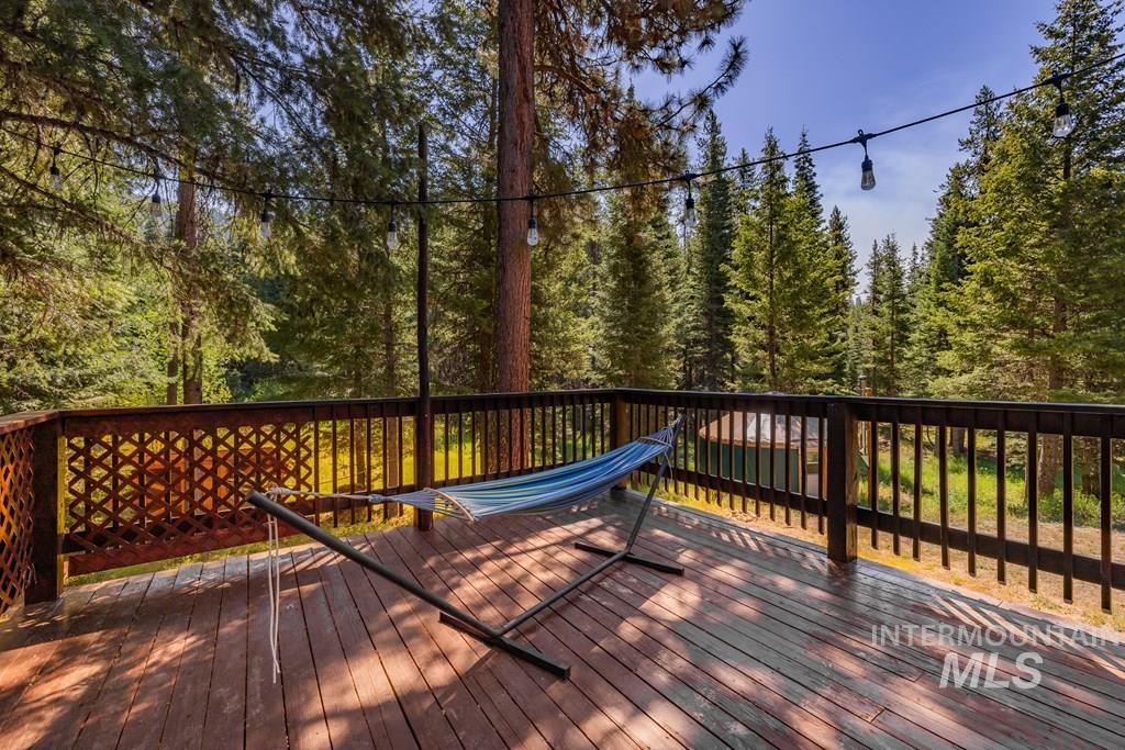 Wooden terrace with a view of trees
